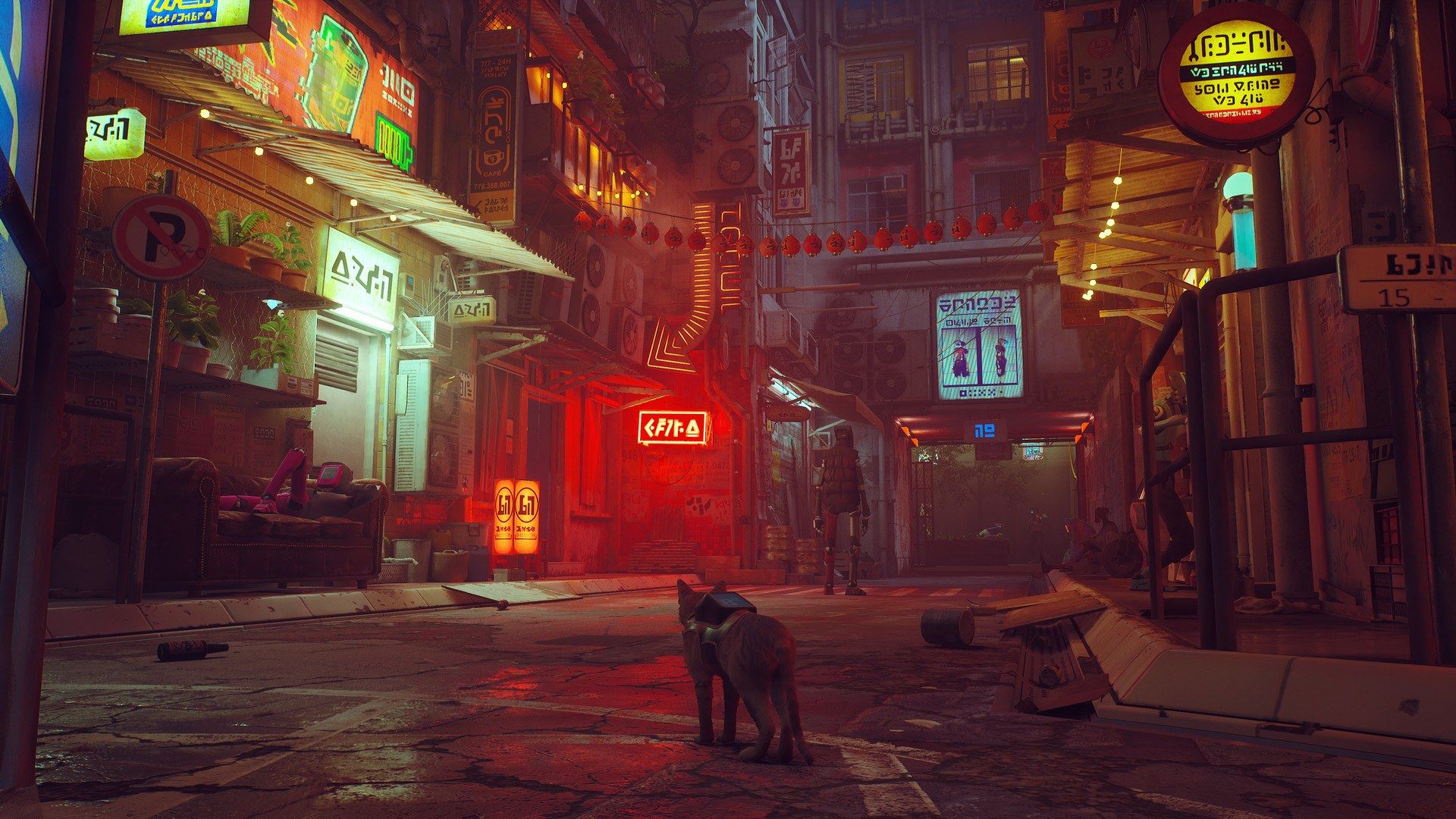 The orange cat walks through a neon-lit street.