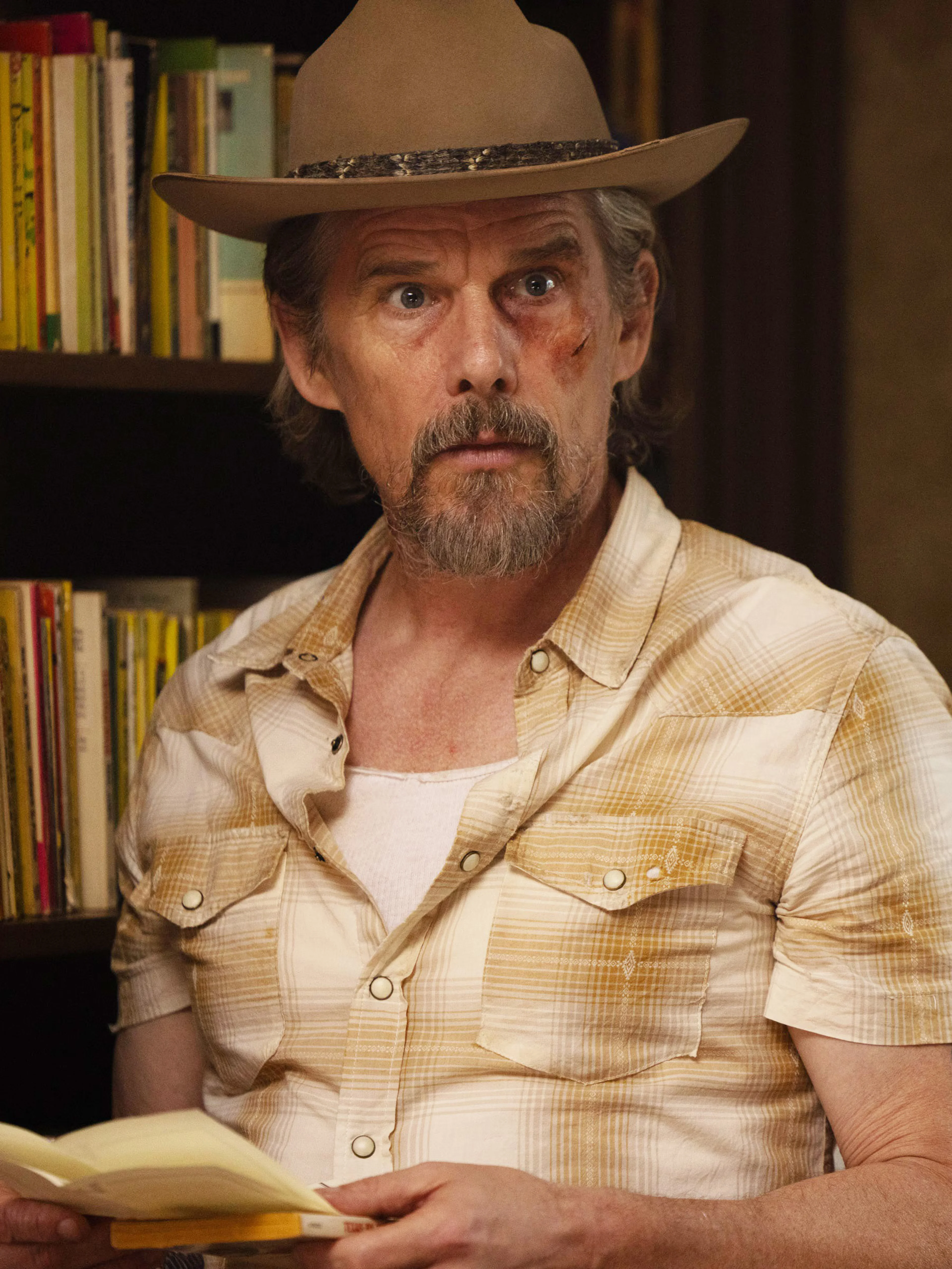 Ethan Hawke wears Lee Raybon’s brown hat and striped shirt.