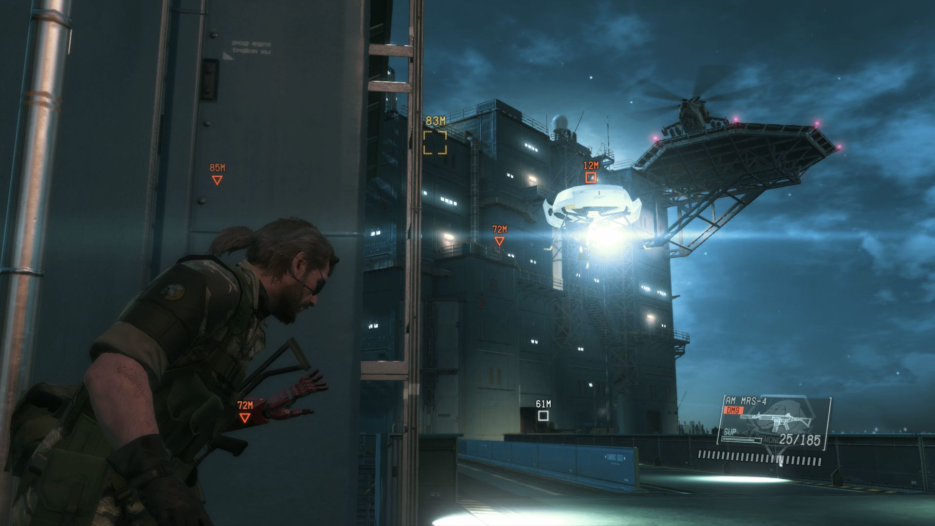 Snake crouches beside a building while a guard marker and the dark outpost are visible ahead.