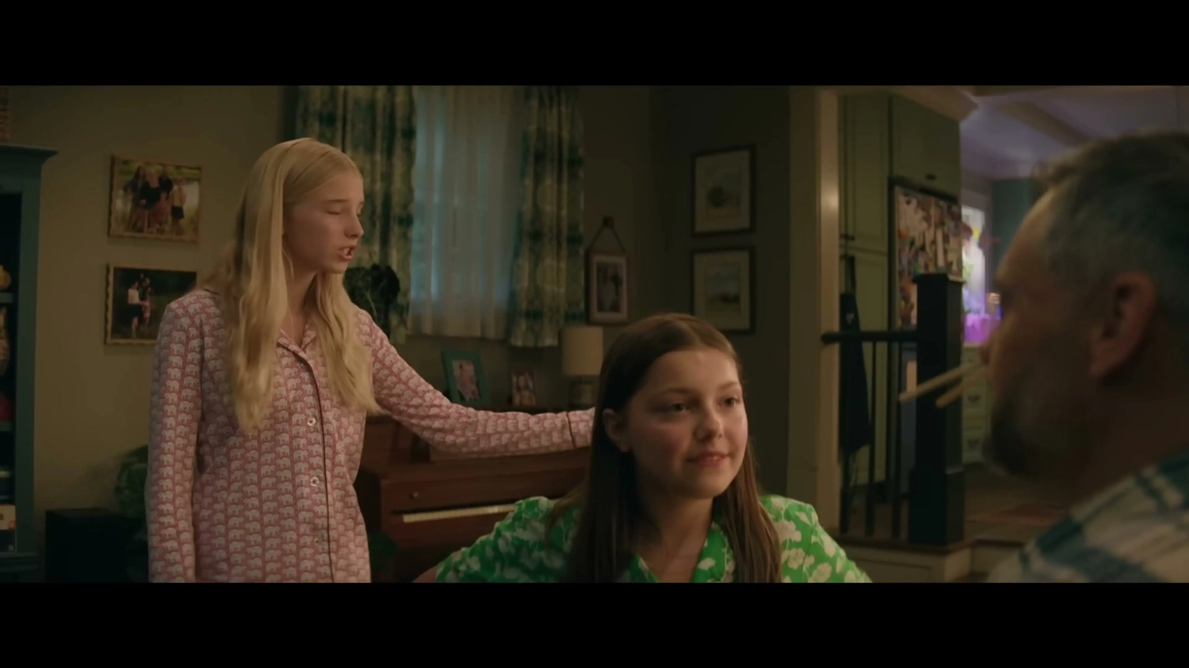 Nate sits at the kitchen table with his daughters.