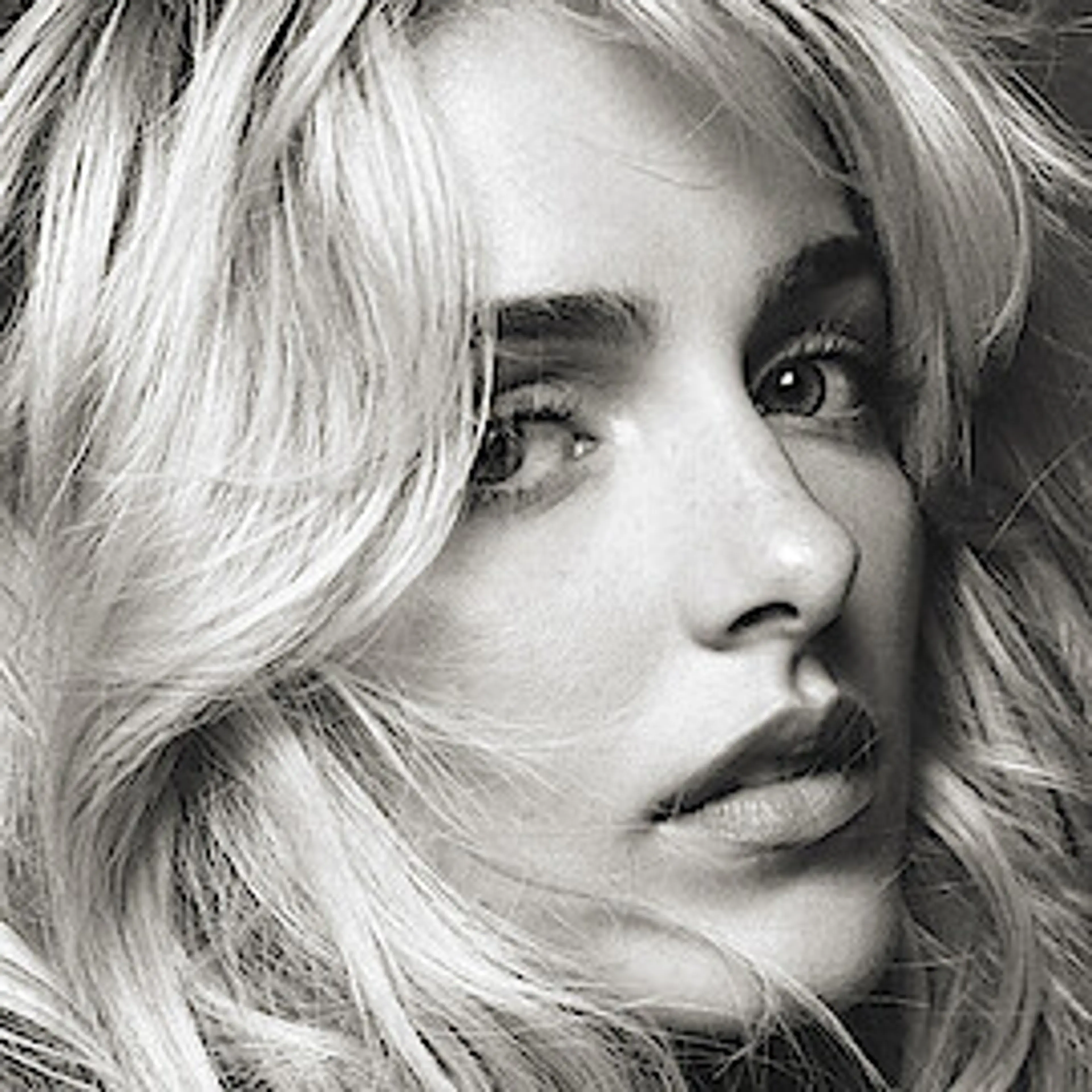 McKenna Grace in a black-and-white promotional portrait.