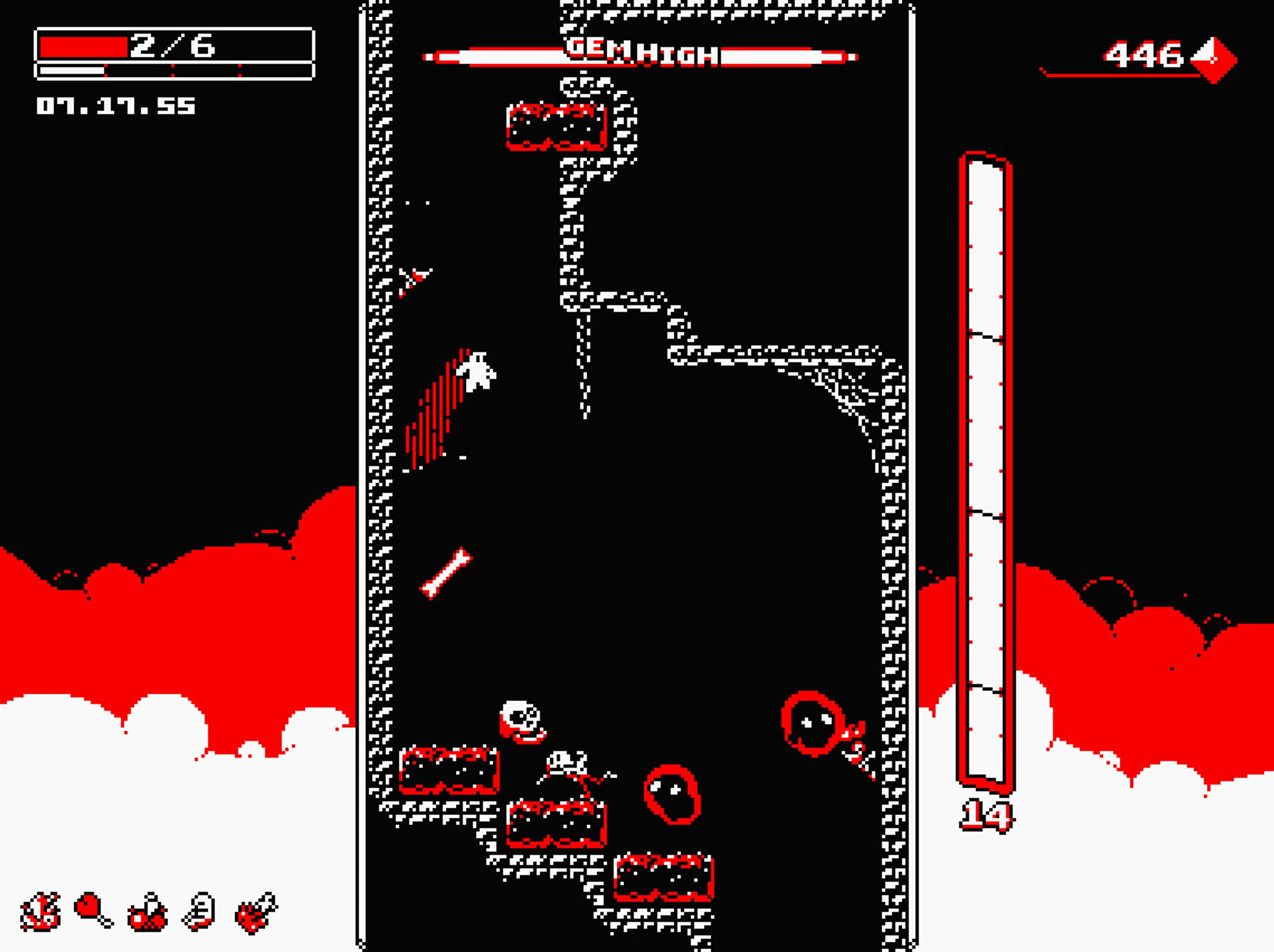Downwell screenshot: white player character near the middle of a narrow shaft, health 2/6 in the upper left, gem money 446 in the upper right, and a tall charge bar at the right.