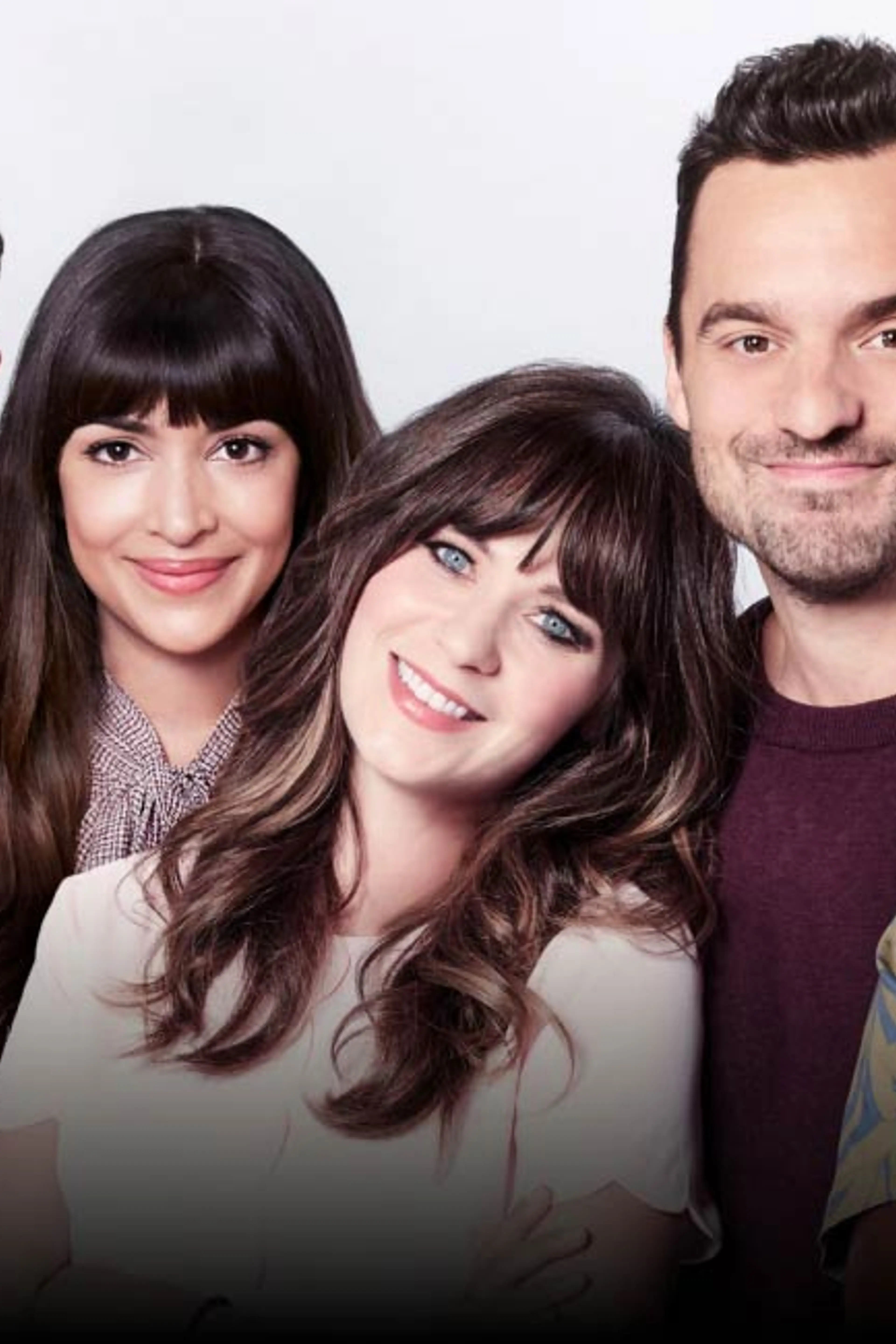 The main cast of New Girl pose together in an official Peacock promotional image.