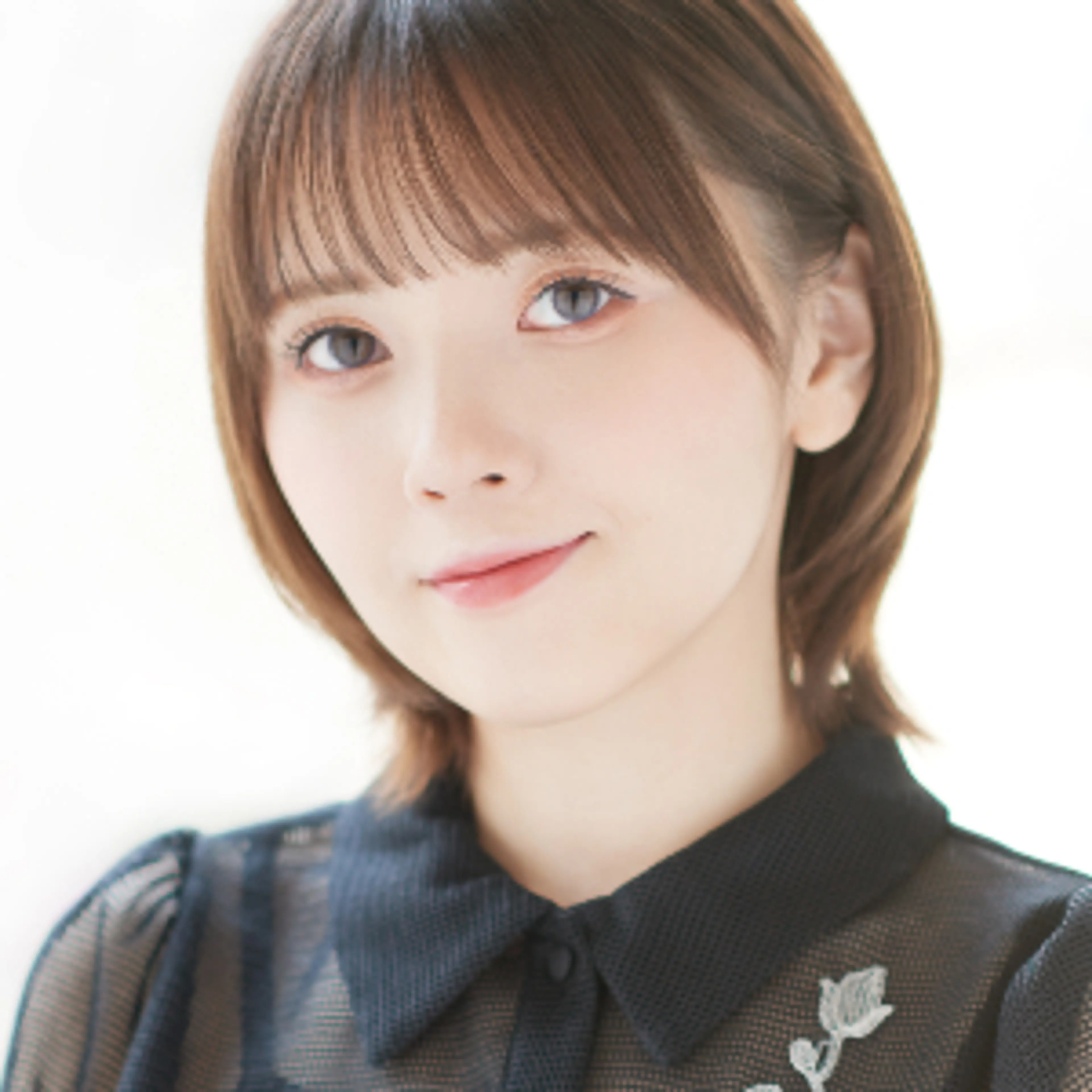 Japanese voice actor Akari Kito in an official Raccoon Dog portrait.