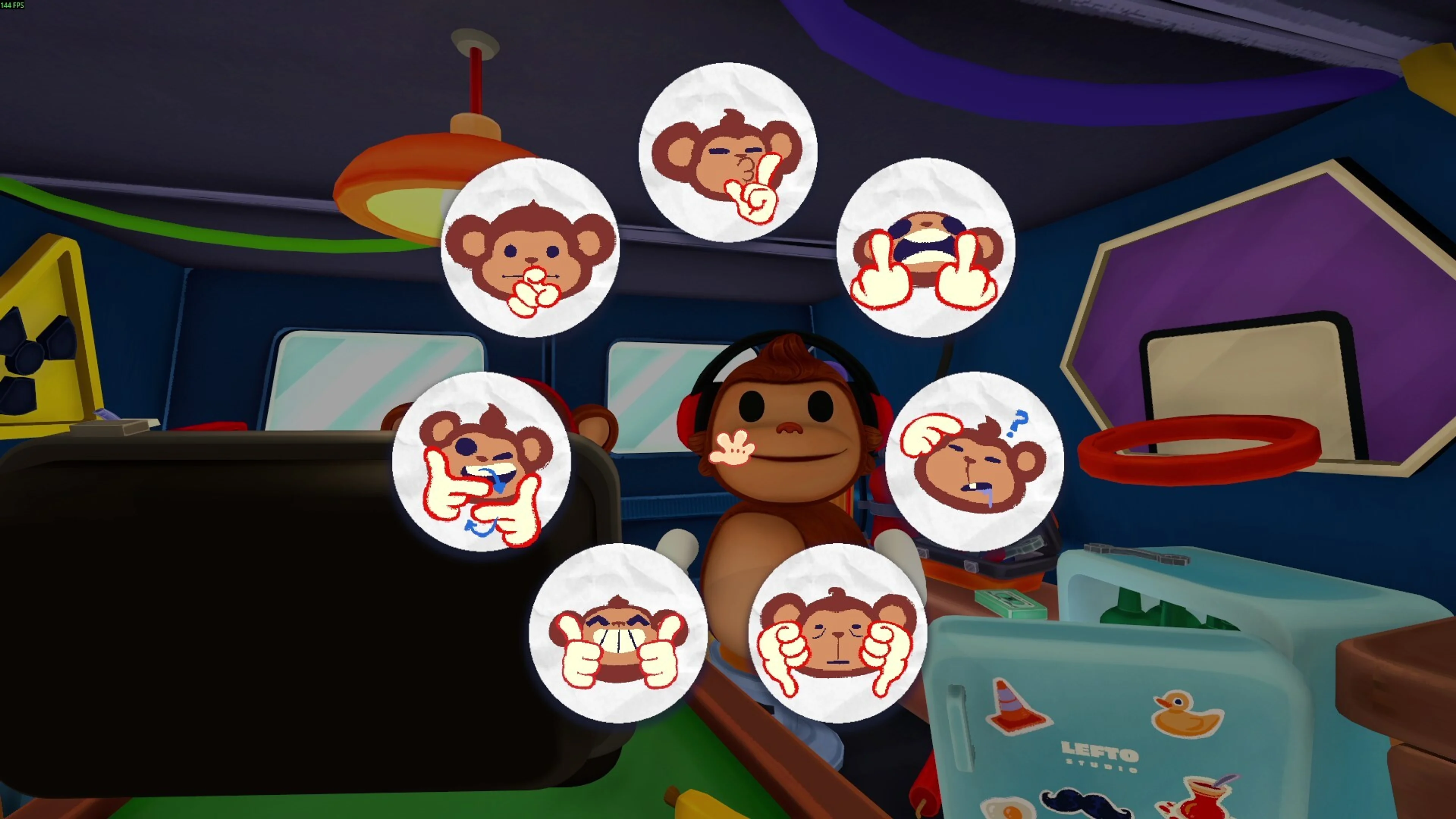 A BOMBANANA monkey stands behind a circular wheel of hand-gesture and reaction emotes.