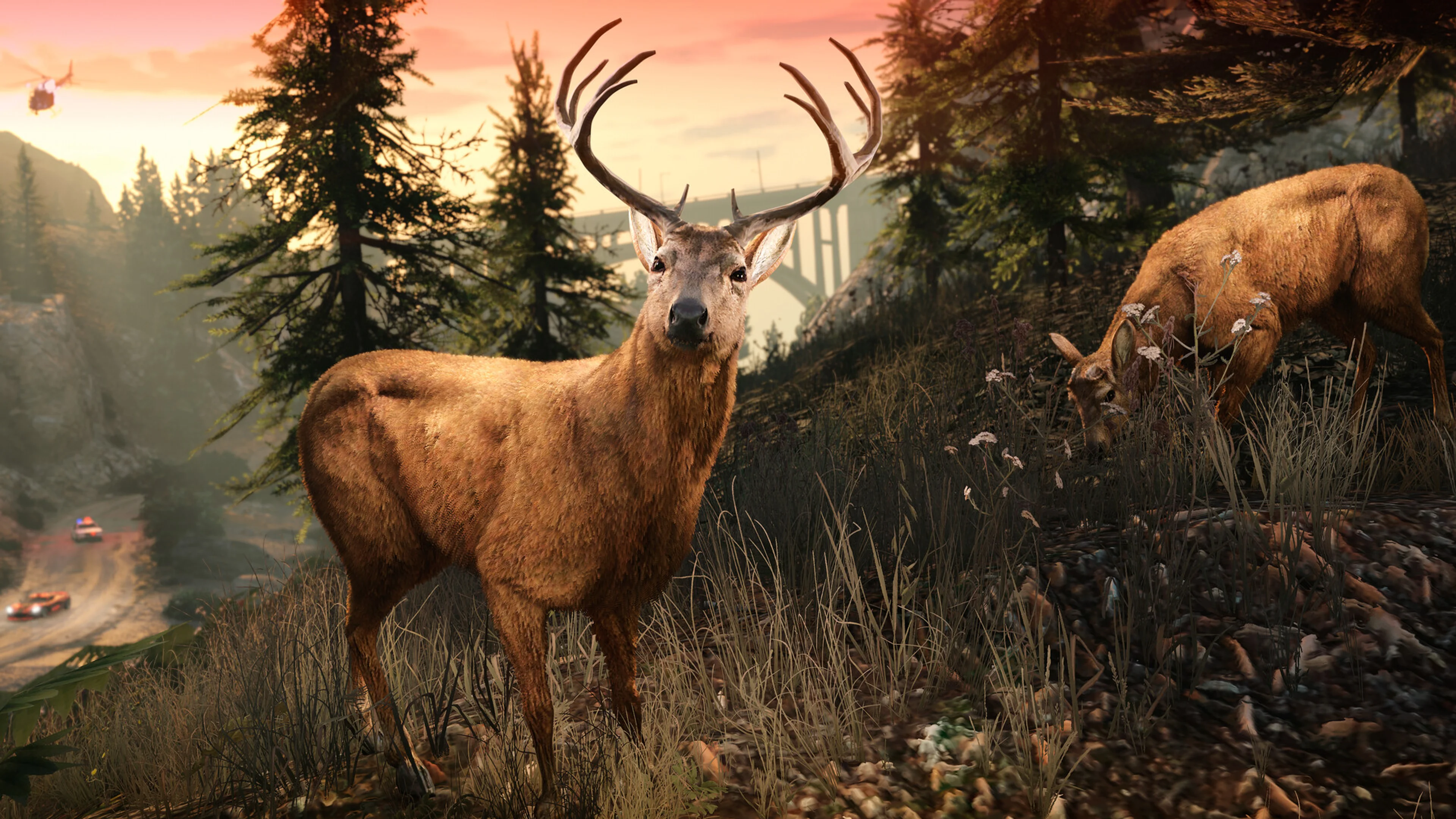 Two deer stand near a mountain road in the GTA 5 Enhanced world.