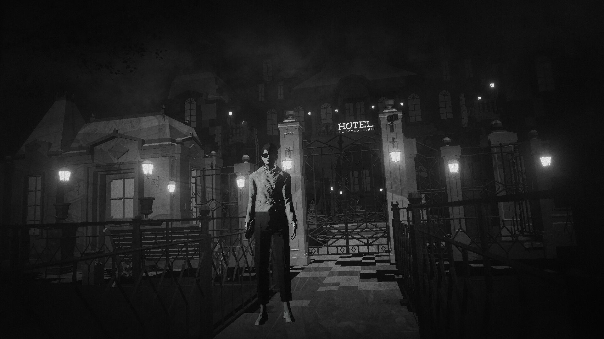 The woman stands outside a gated hotel at night beneath its illuminated HOTEL sign.