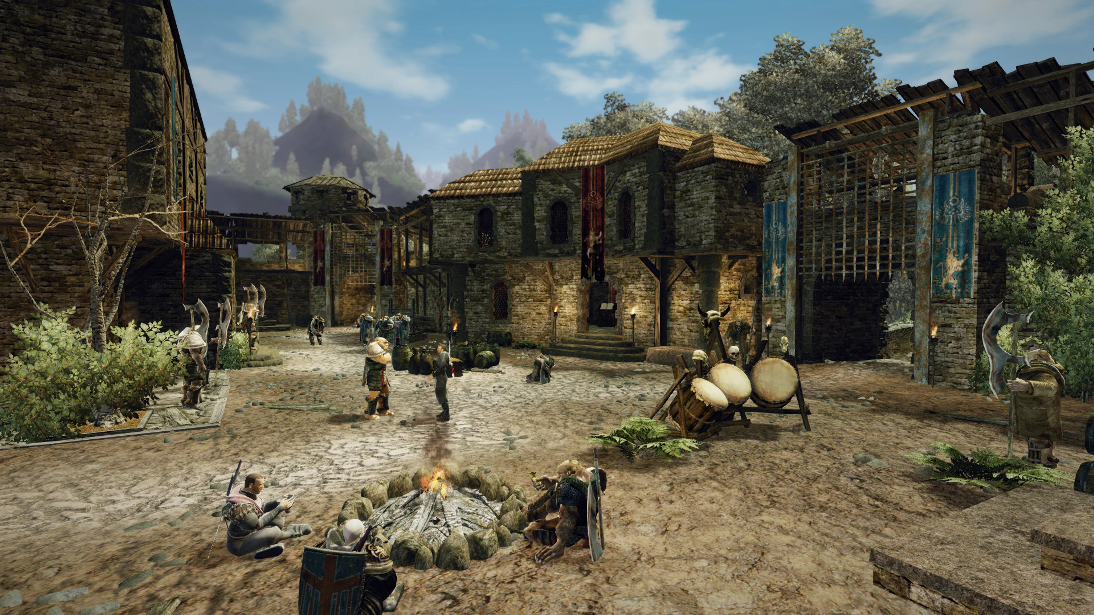 Armored characters gather around a campfire in a Gothic 3 Classic settlement.