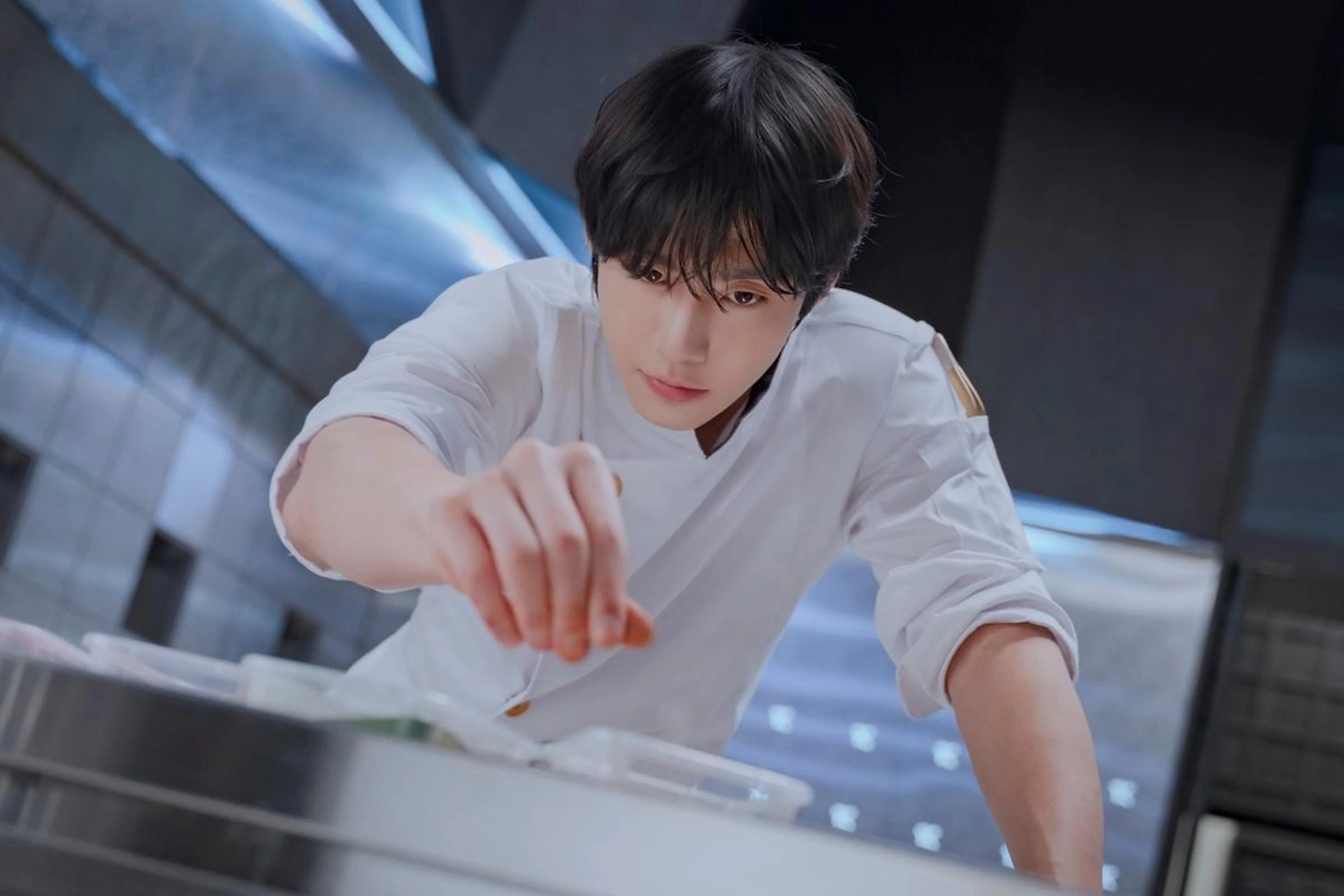 Ahn Hyo-seop in a kitchen for the drama Final Table.