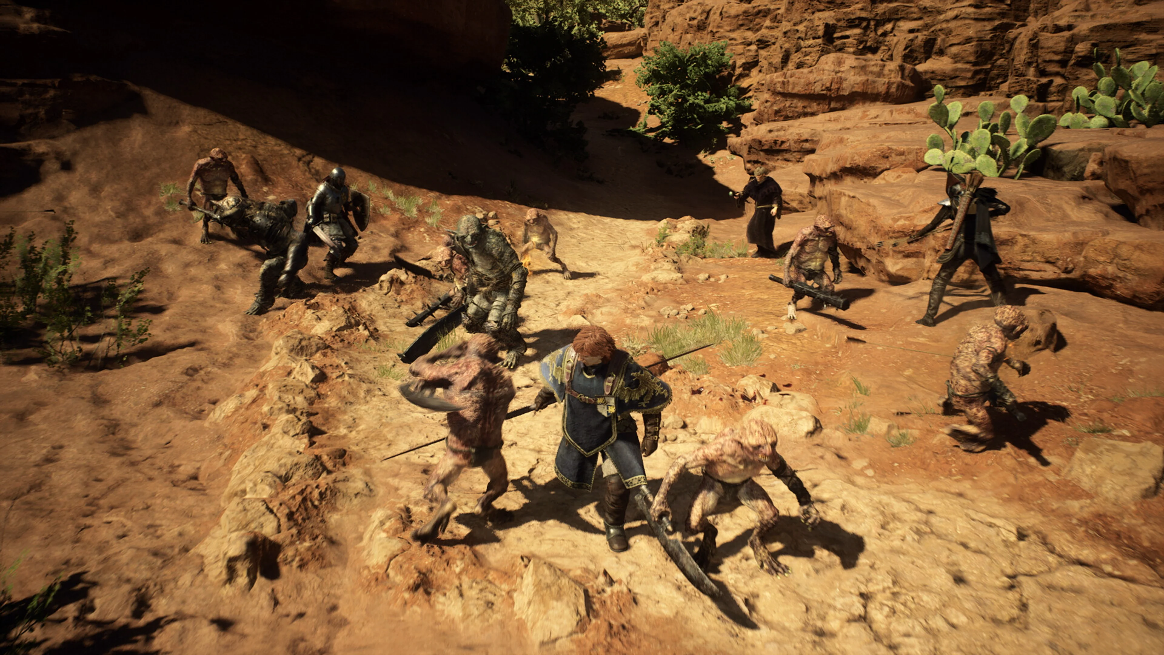 The Arisen and Pawns fight enemies on a rocky Battahl road in Dragon's Dogma 2.