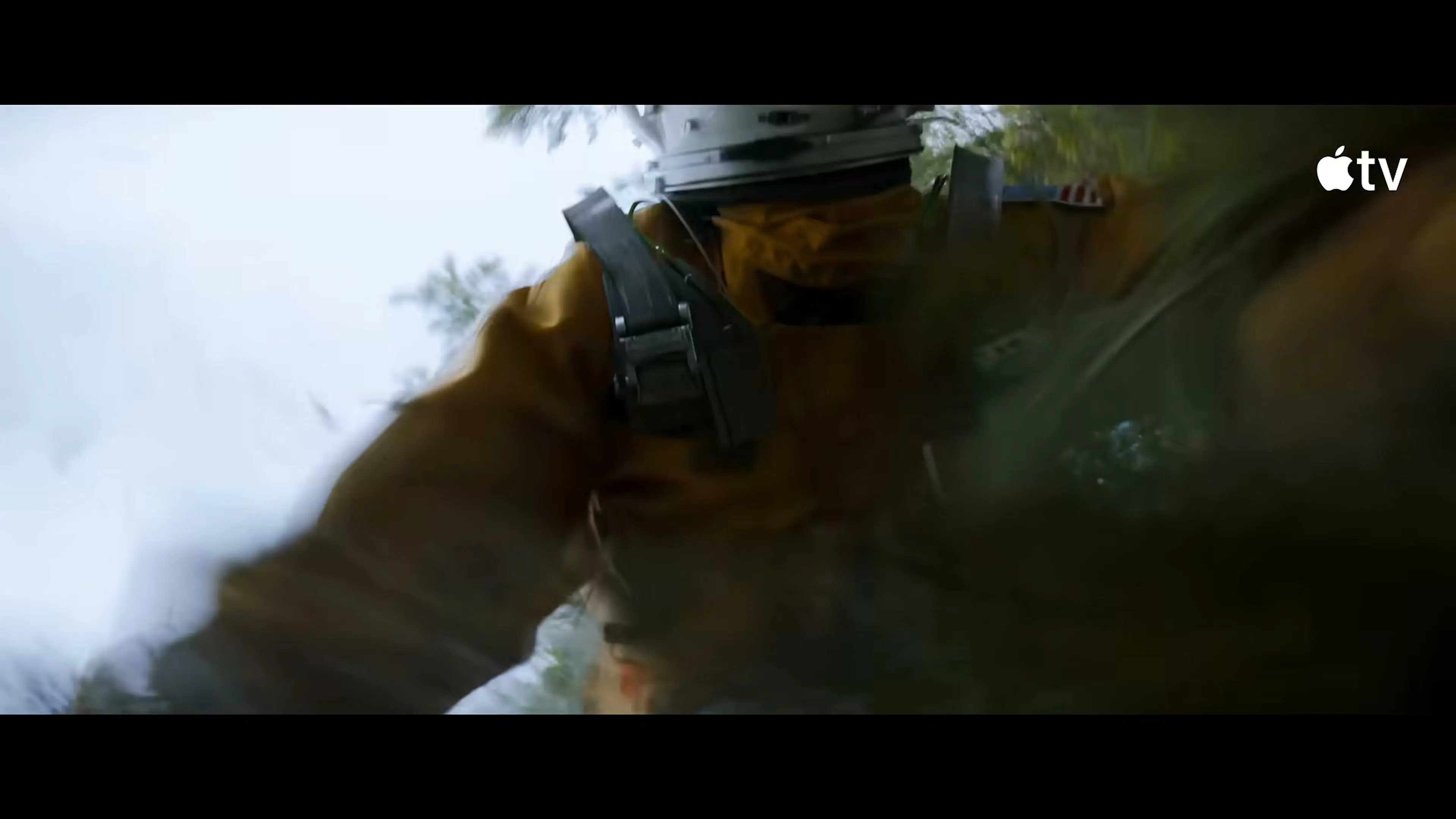 An aircraft breaks apart above the clouds during Troy's mission in Mayday.