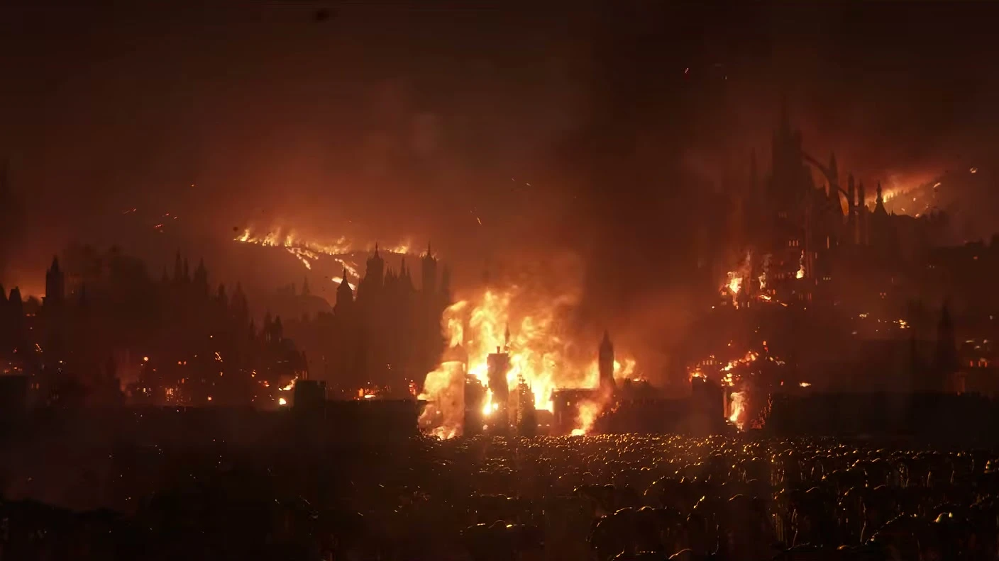 A vast gothic city burns beneath a dark red sky.