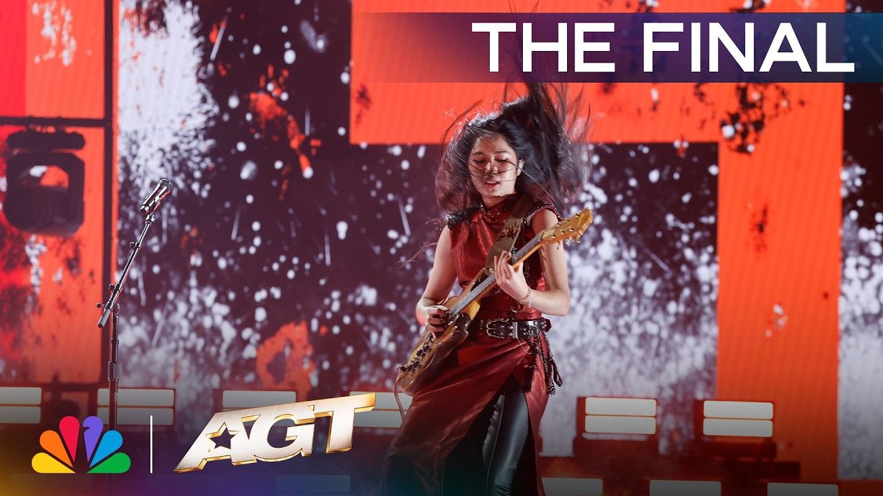 Nene Royal sings in red on the America’s Got Talent finale stage.