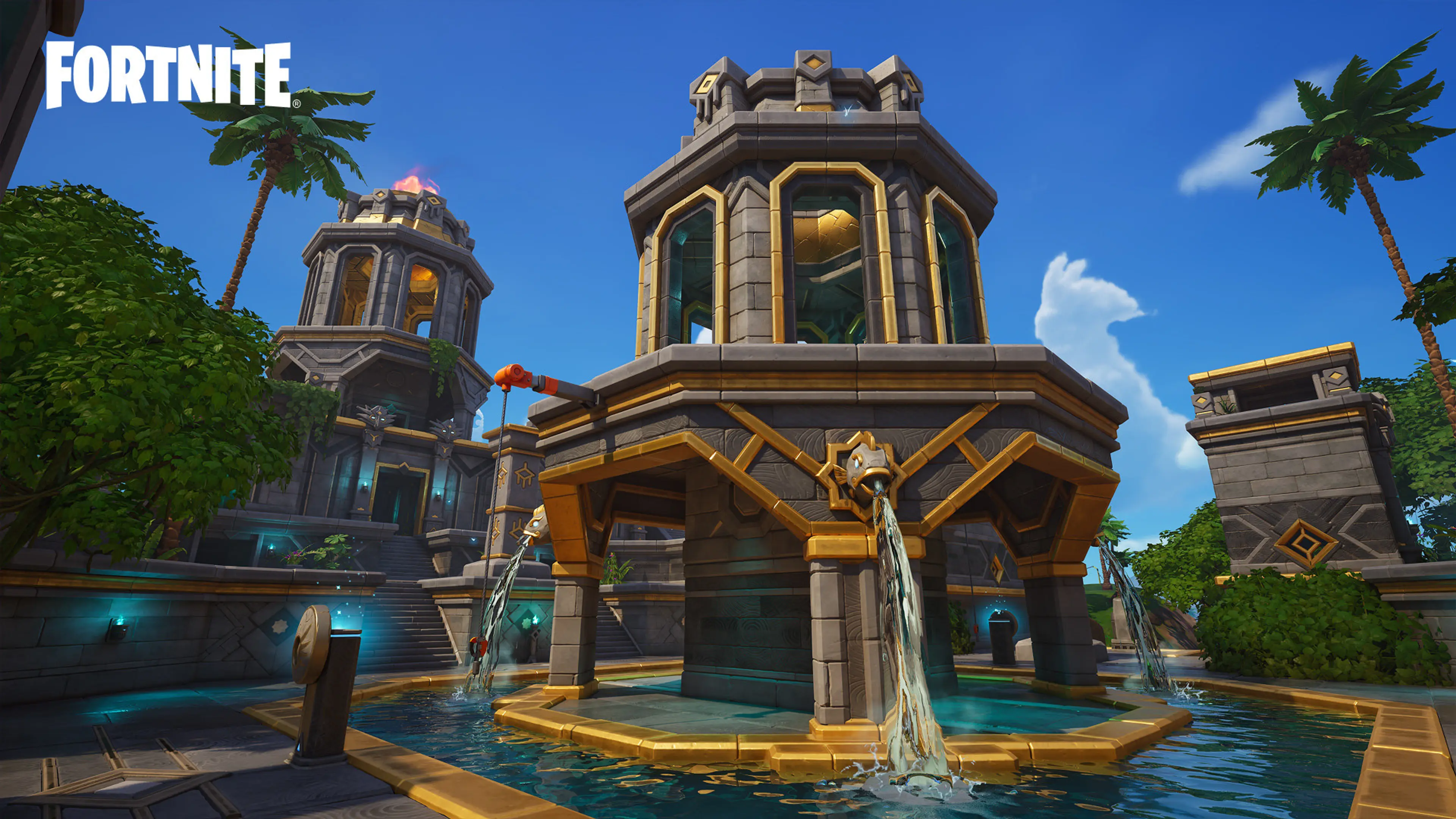 A stone fountain and twin towers stand in a Fortnite plaza surrounded by palm trees.