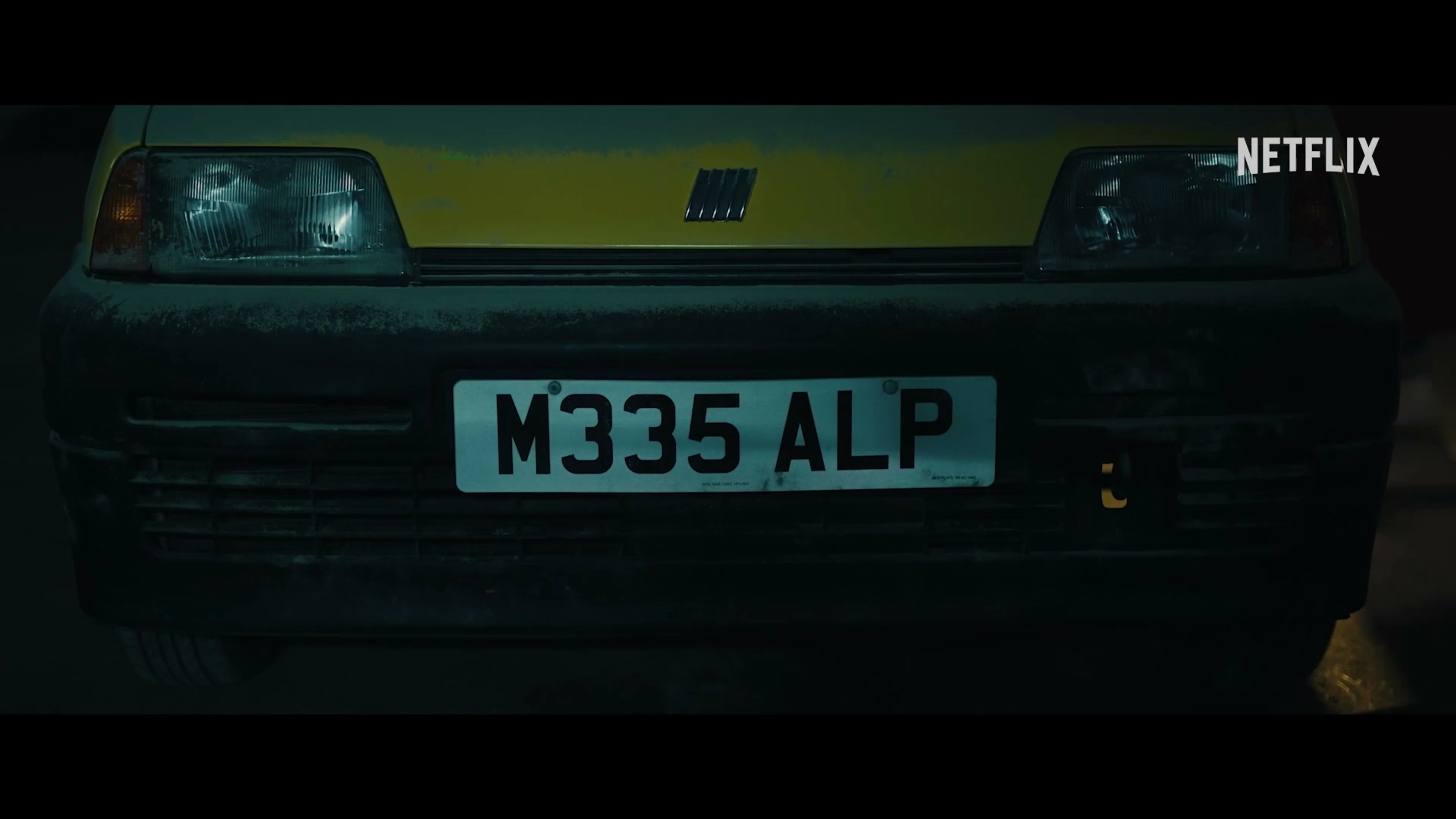 The yellow Fiat with the M335 ALP plate faces the camera in The Inbetweeners 3 announcement.