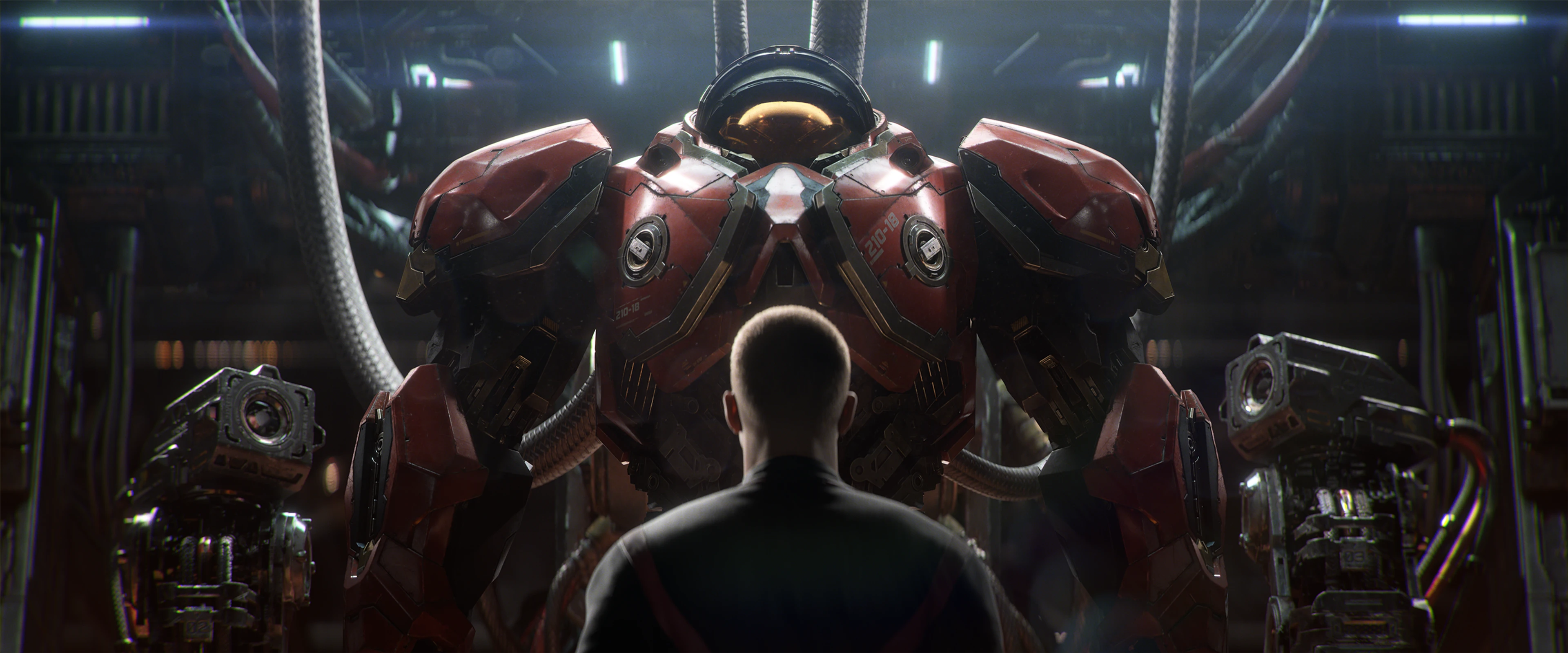 A Dominion recruit stands in front of red powered armor in the new StarCraft cinematic.