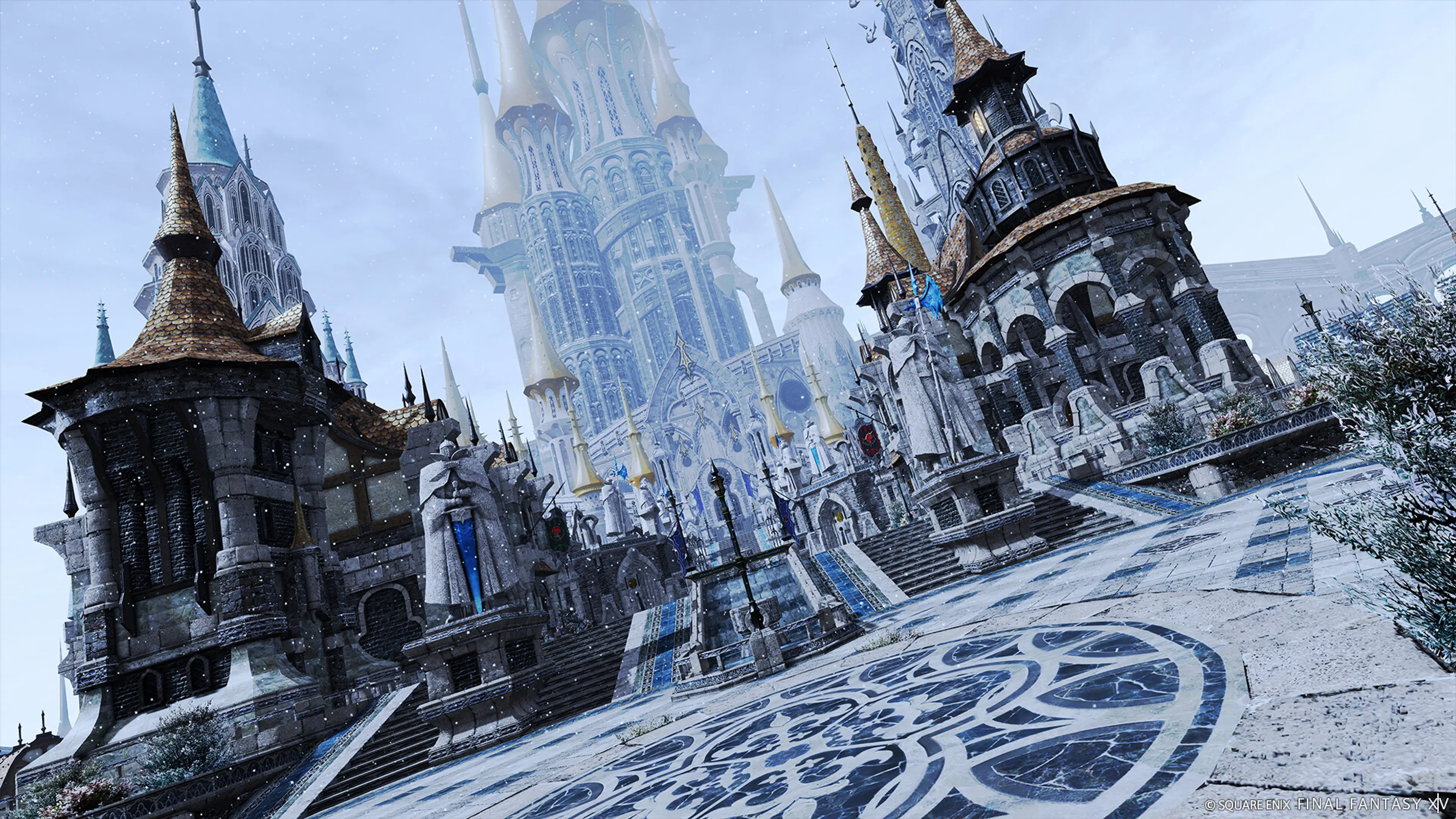 Snow falls across a plaza lined with stone towers in Final Fantasy XIV.
