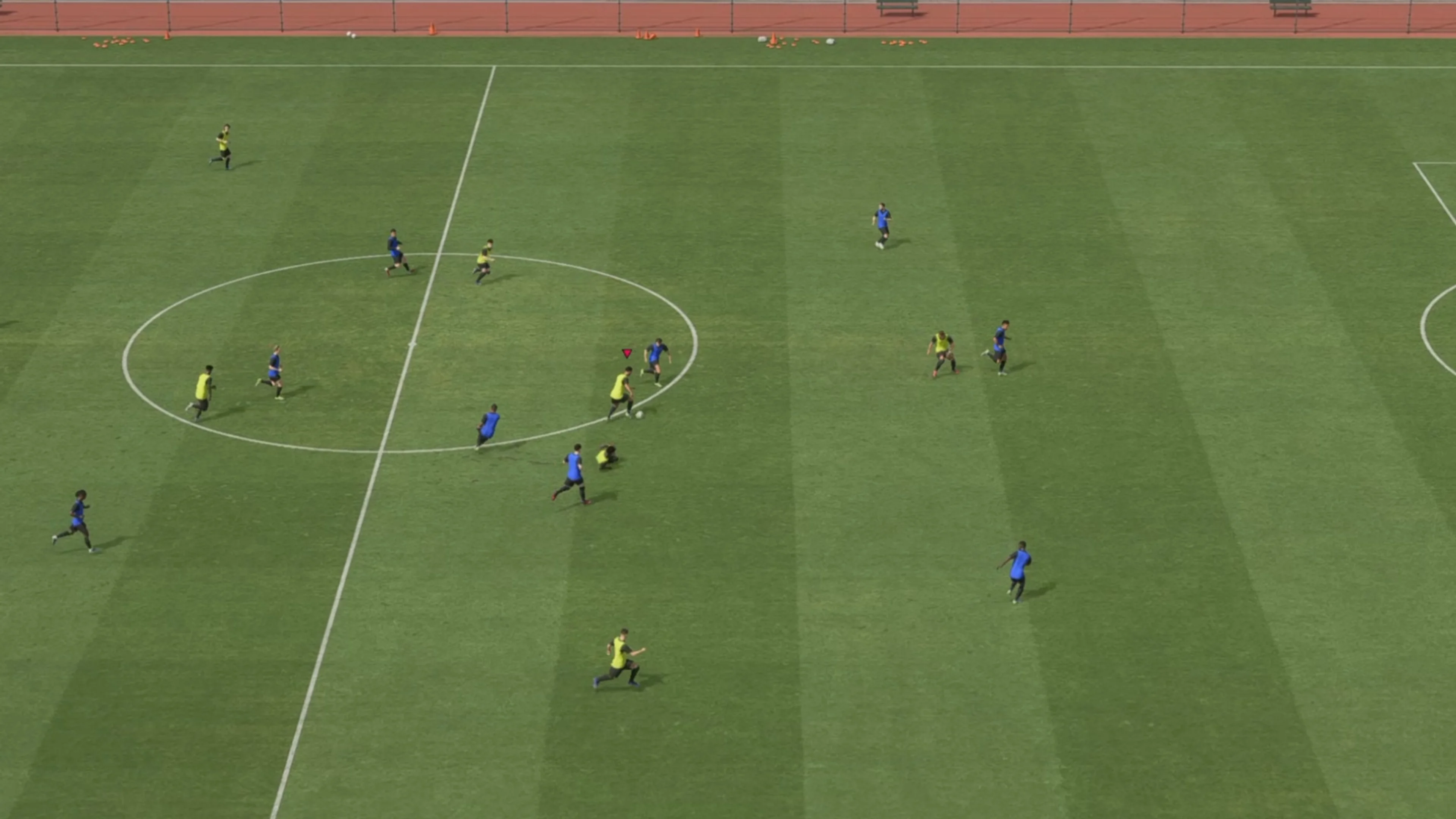 Players in yellow training bibs face blue-shirted teammates in an FC 27 Career Mode practice match.