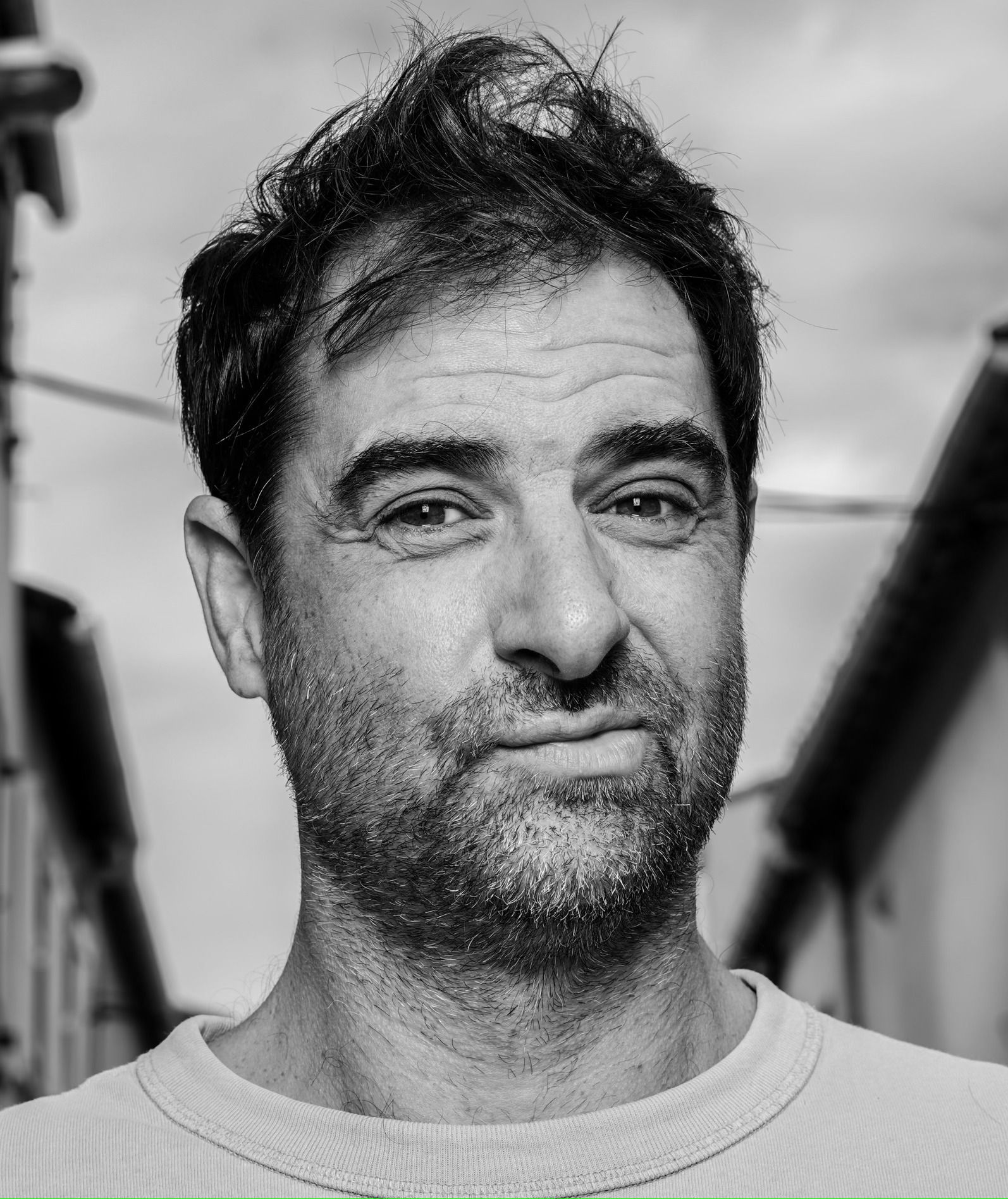 Black-and-white portrait of actor Grégory Montel at a 2023 television festival in Marseille.