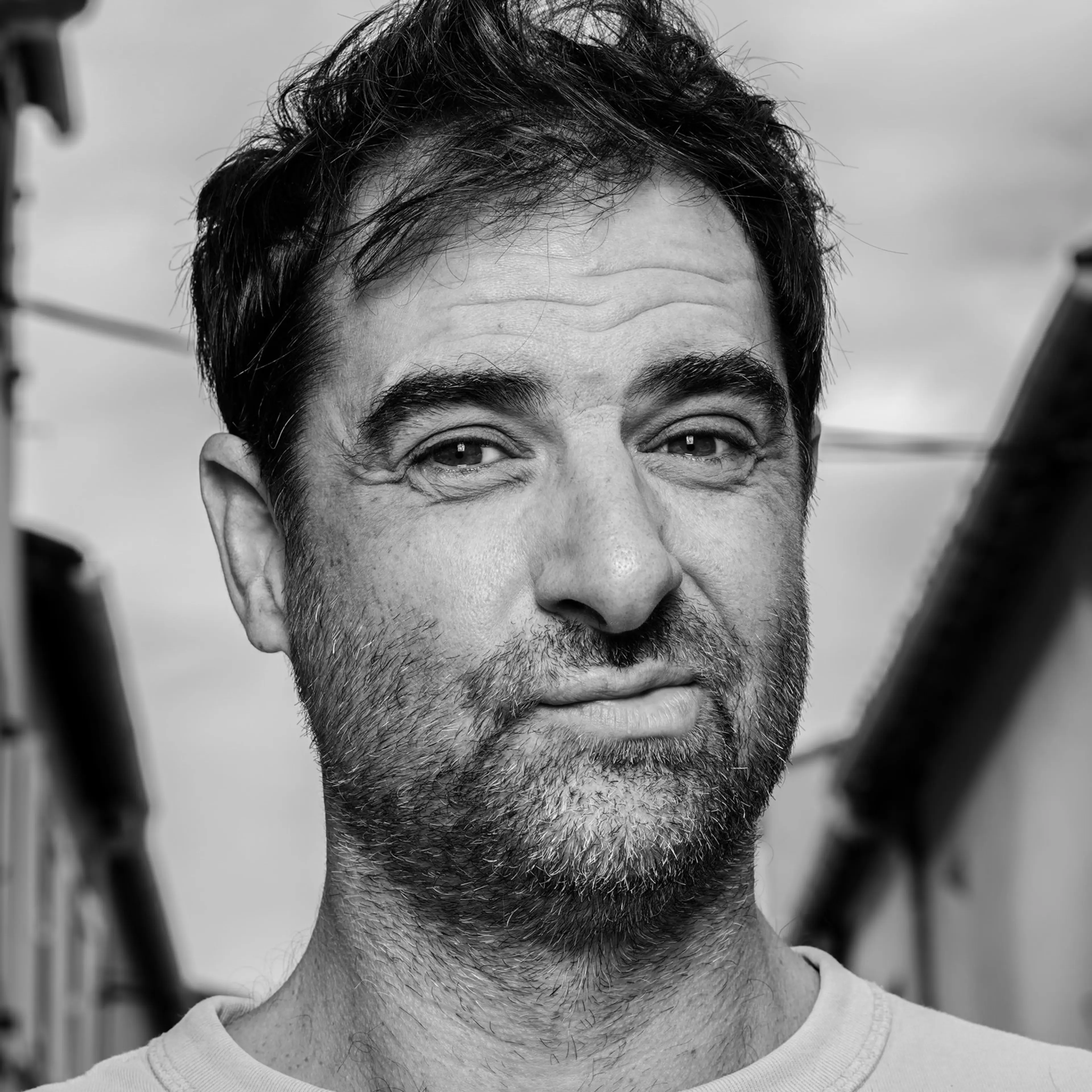 Black-and-white portrait of actor Grégory Montel at a 2023 television festival in Marseille.