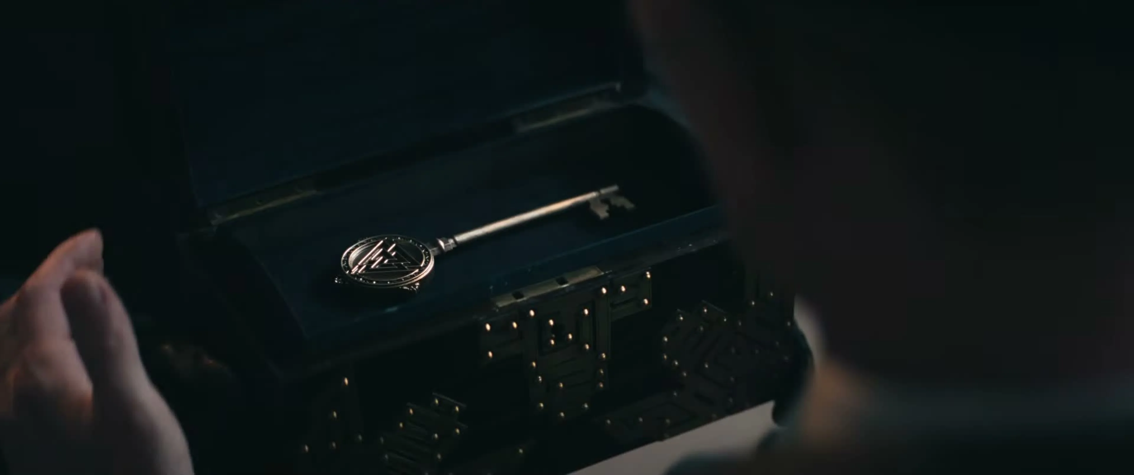 An ornate key rests inside Wilhelm’s open black box in The Last Temptation of Becky.
