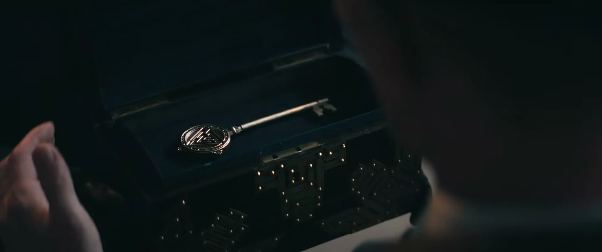 An ornate key rests inside Wilhelm’s open black box in The Last Temptation of Becky.