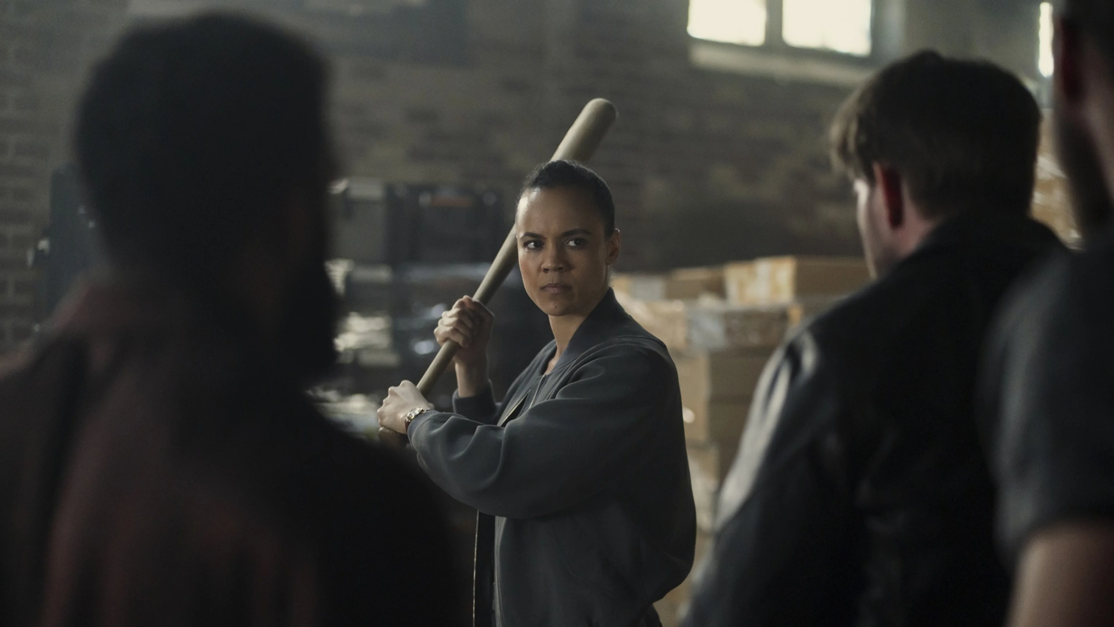 Maria Sten as Frances Neagley holding a baseball bat in the Season 1 trailer.