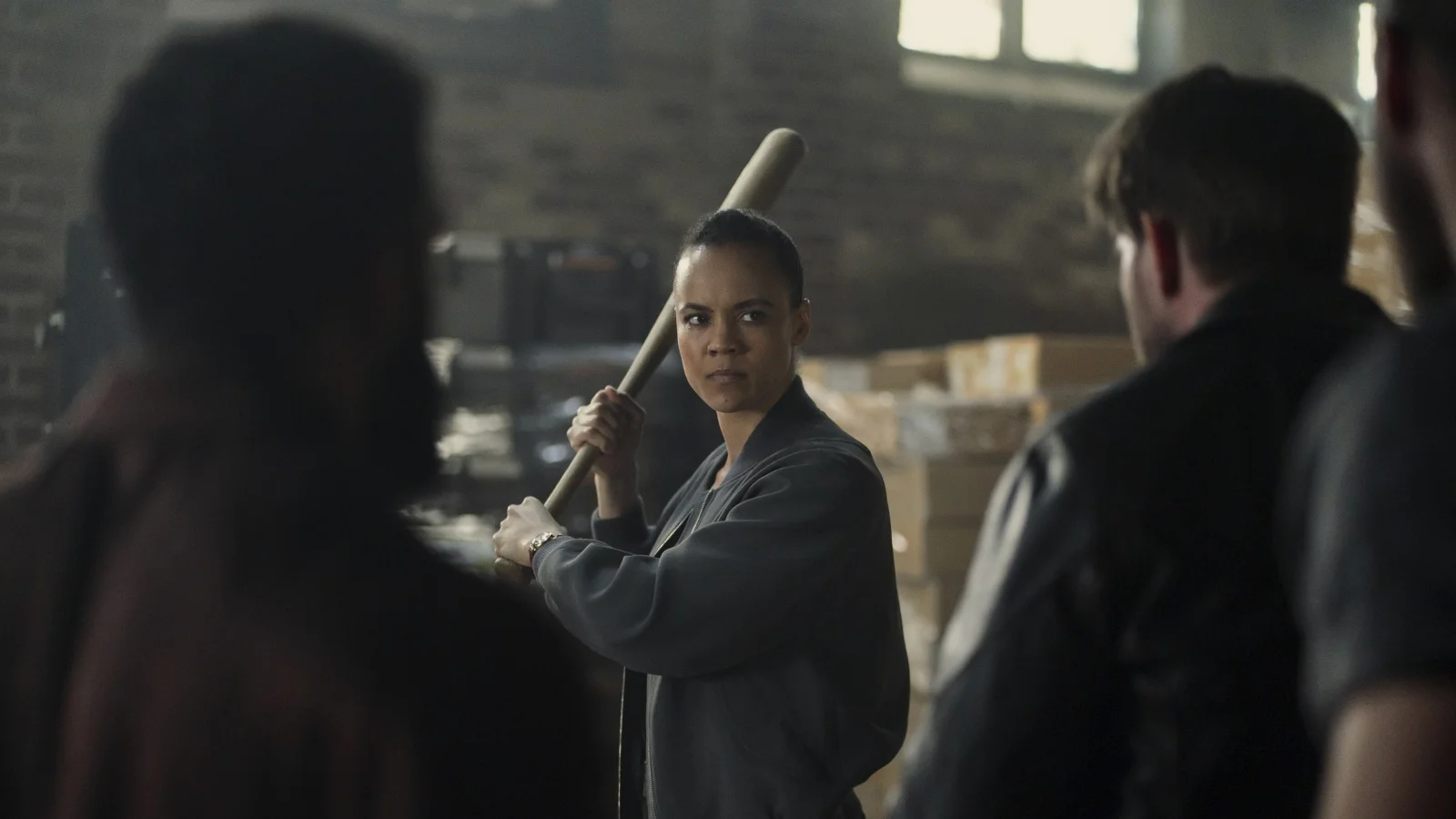 Maria Sten as Frances Neagley holding a baseball bat in the Season 1 trailer.