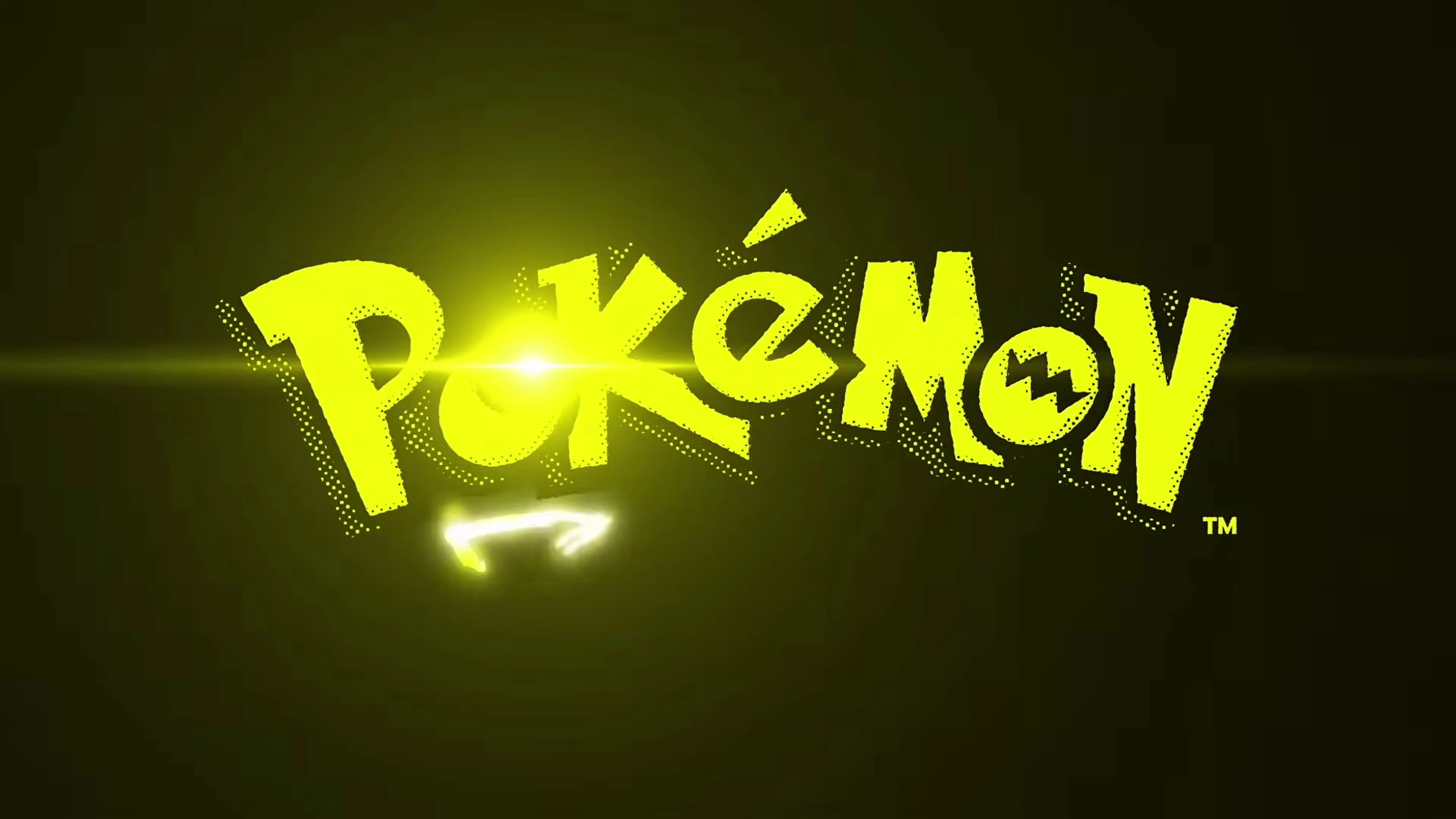 An official teaser frame shows Pokémon cards arranged across a table beneath a city skyline.