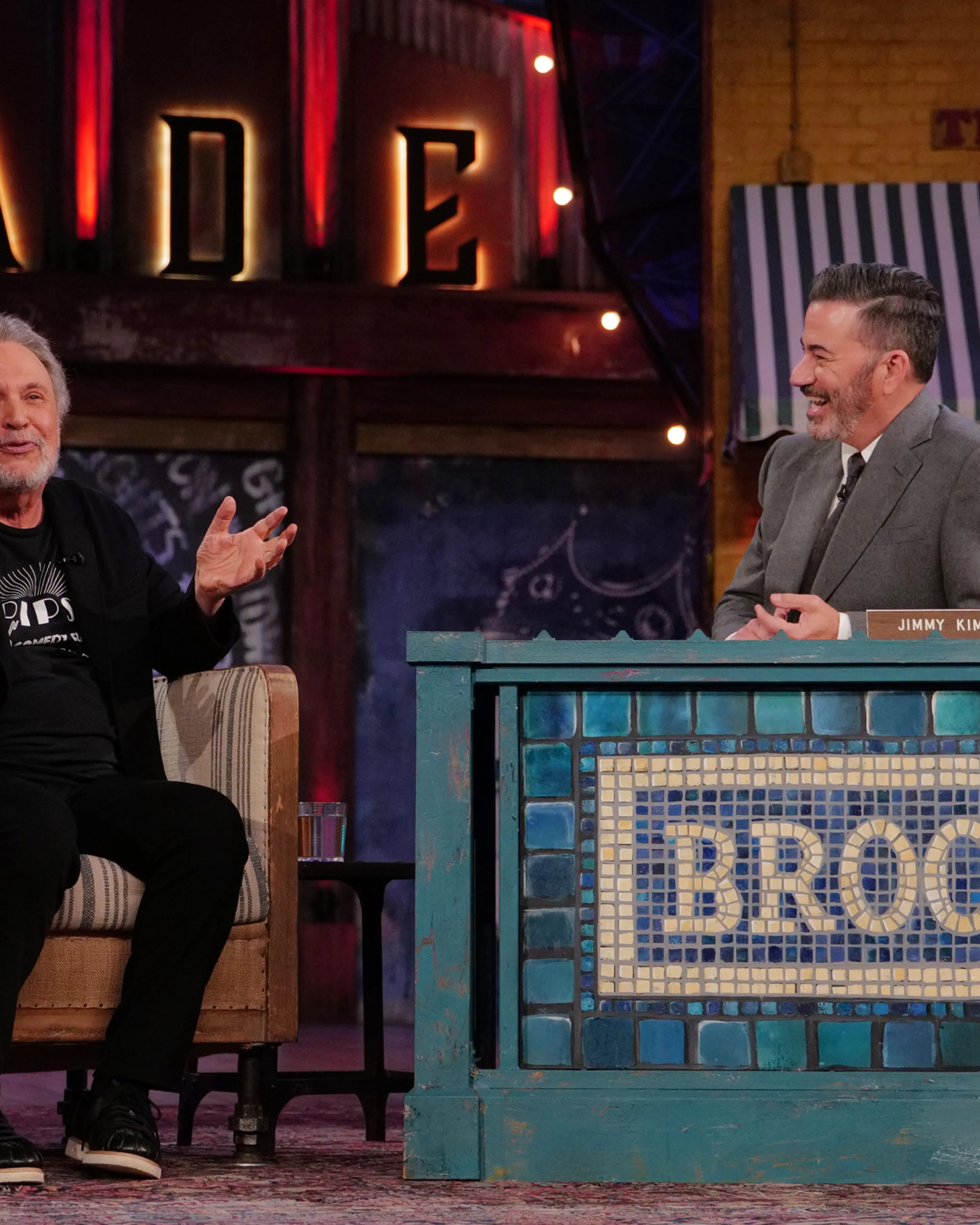 Billy Crystal gestures while talking with Jimmy Kimmel in the Brooklyn studio.