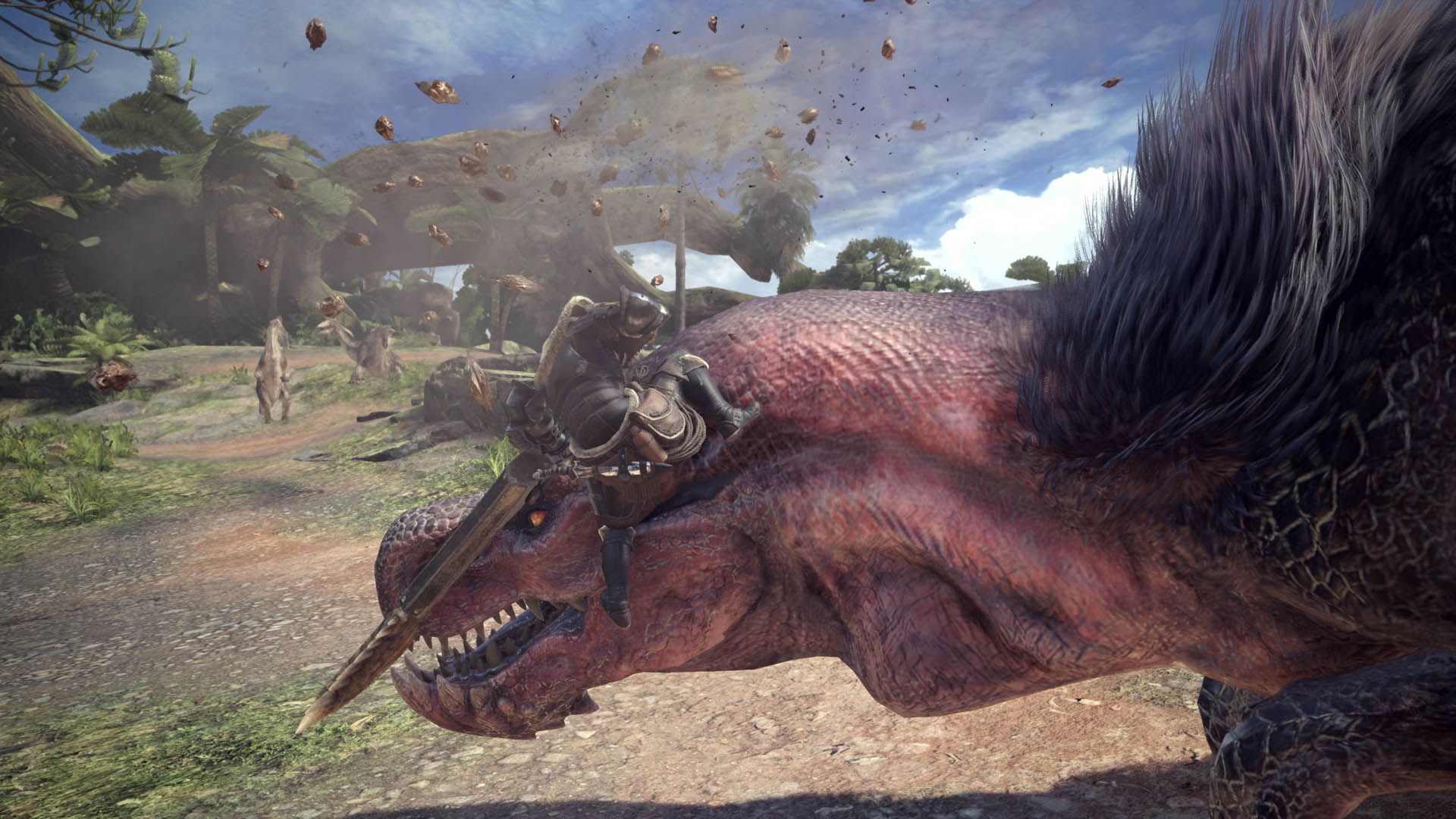 A hunter faces a large red-furred monster in a grassy Monster Hunter: World area.