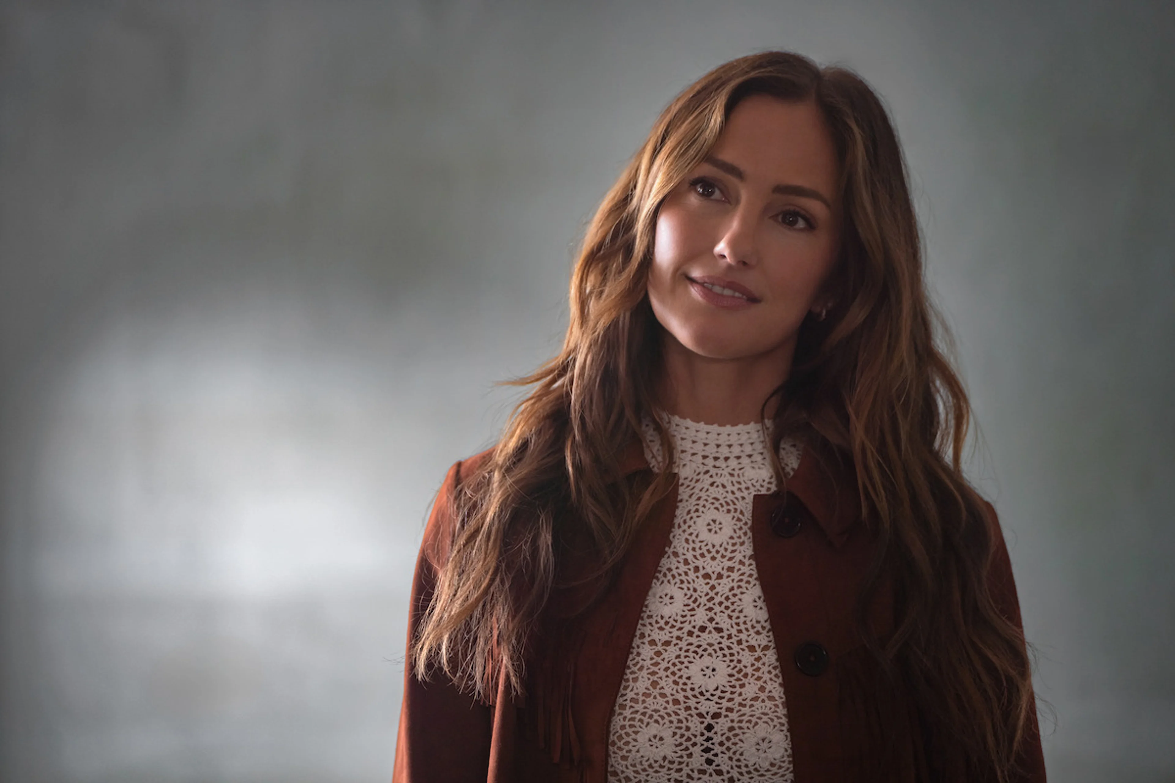 Minka Kelly as Quinn O’Grady looks across a room in Ransom Canyon Season 2.