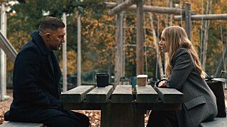 Tom Hardy as Harry Da Souza speaks with Joanne Froggatt in an official MobLand Season 2 still.