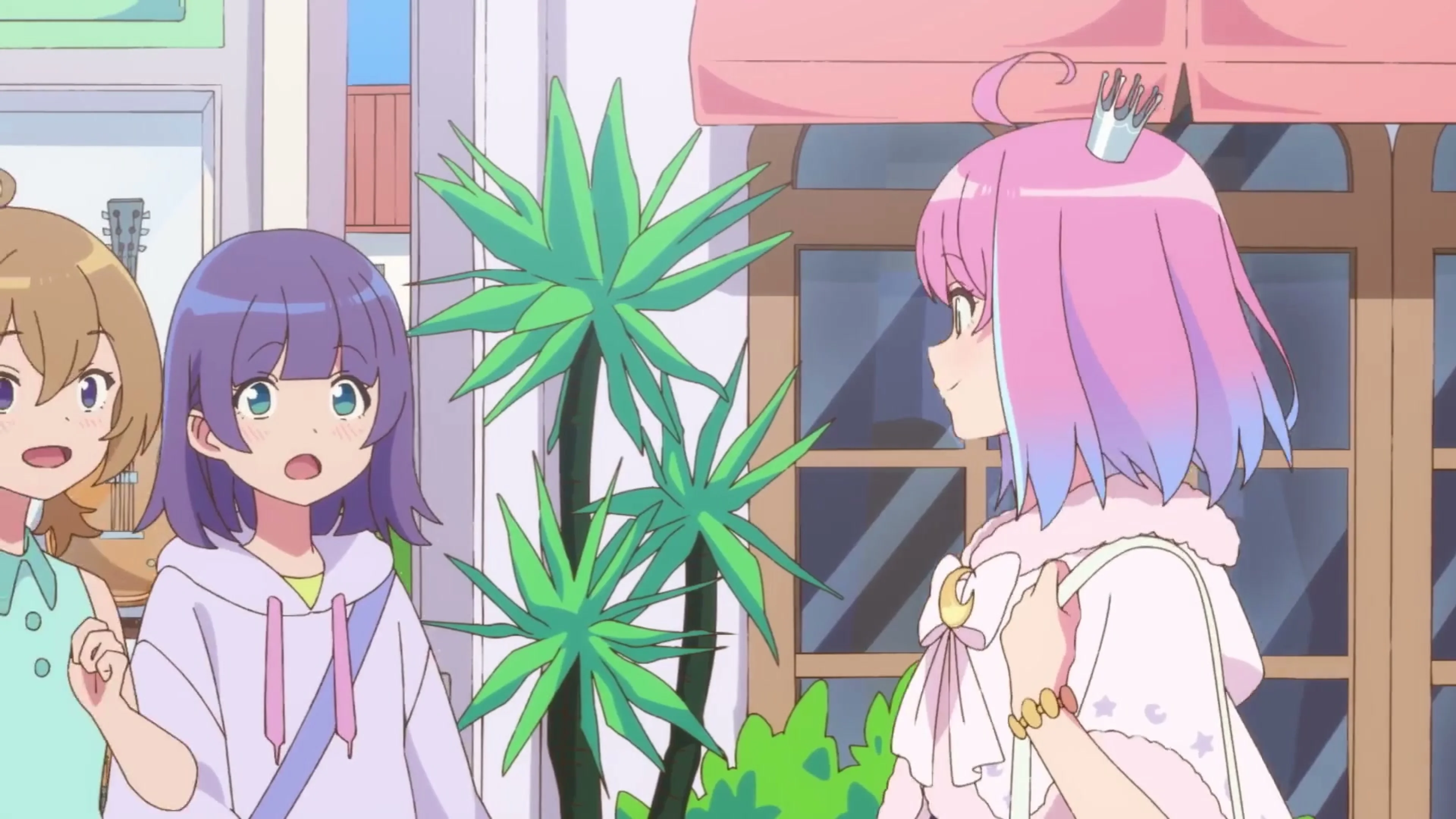 Three animated hololive characters talk inside a bright room with plants and large windows.