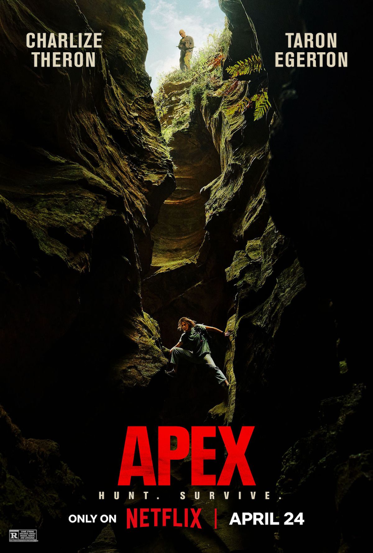 Official Apex poster with Charlize Theron below Taron Egerton in a rocky ravine.