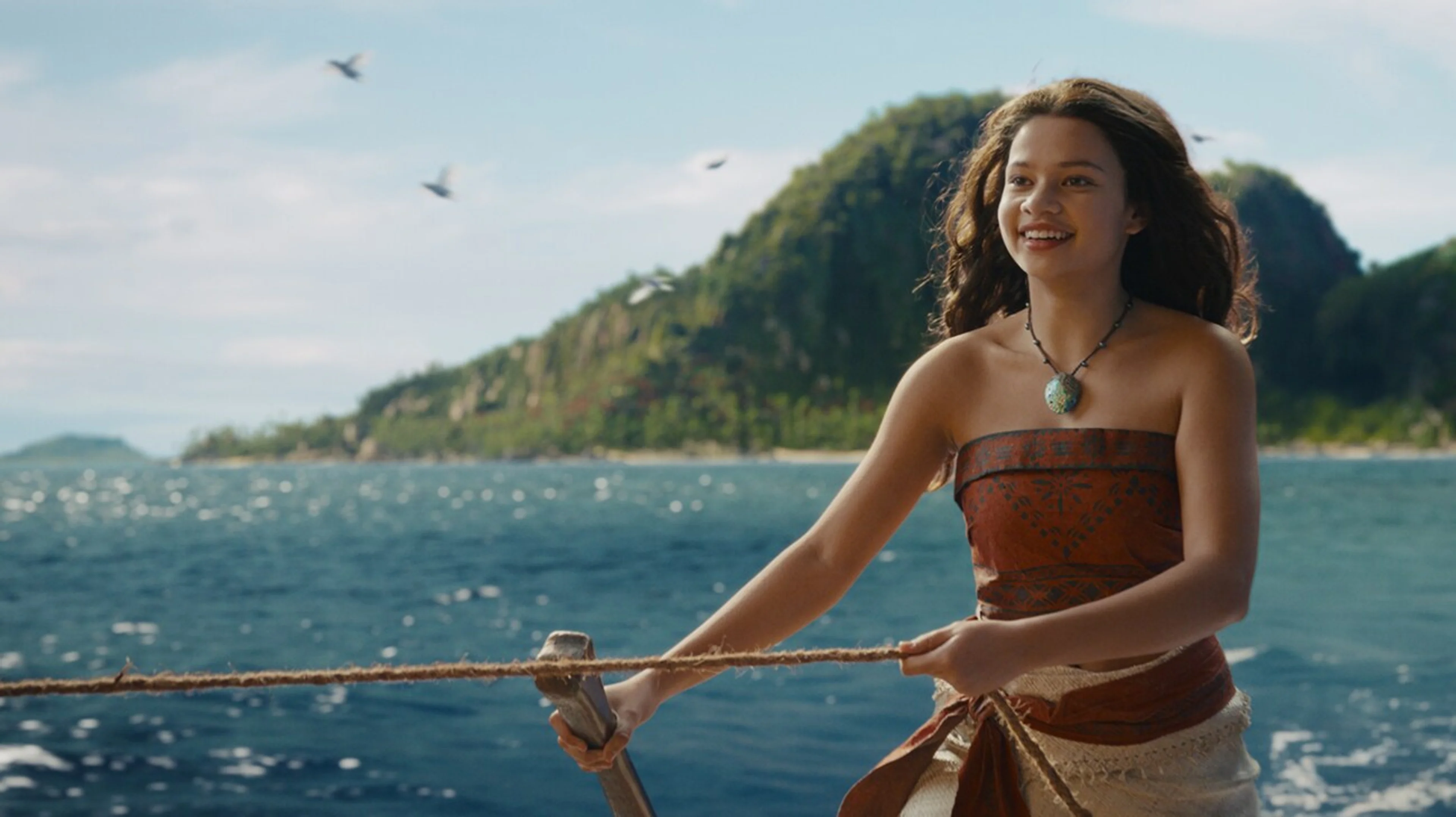 Catherine Lagaʻaia as Moana on a boat.