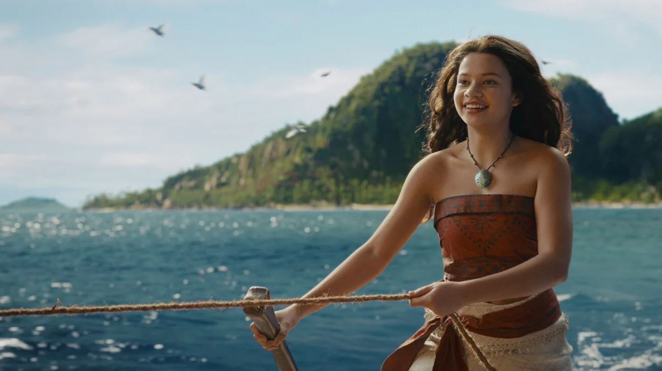 Catherine Lagaʻaia as Moana on a boat.