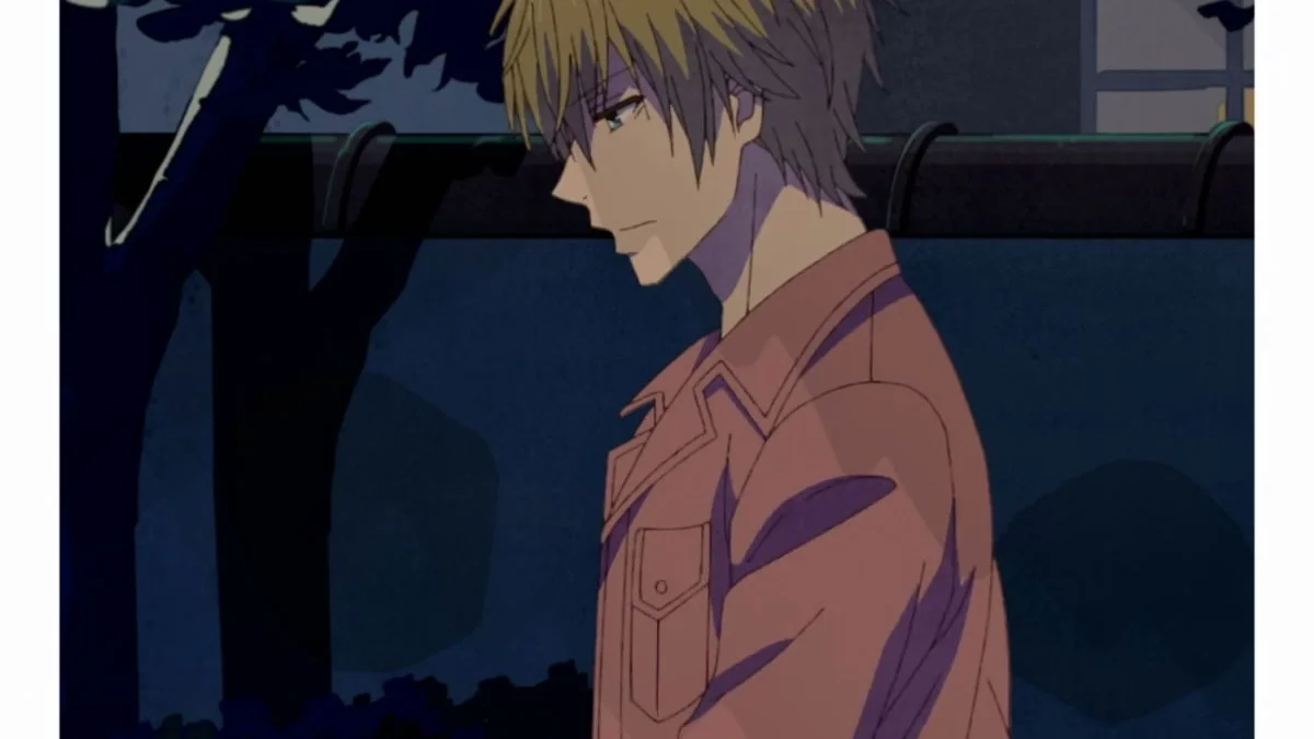 Tasuku Kurosaki stands outside at night in the Dengeki Daisy trailer.