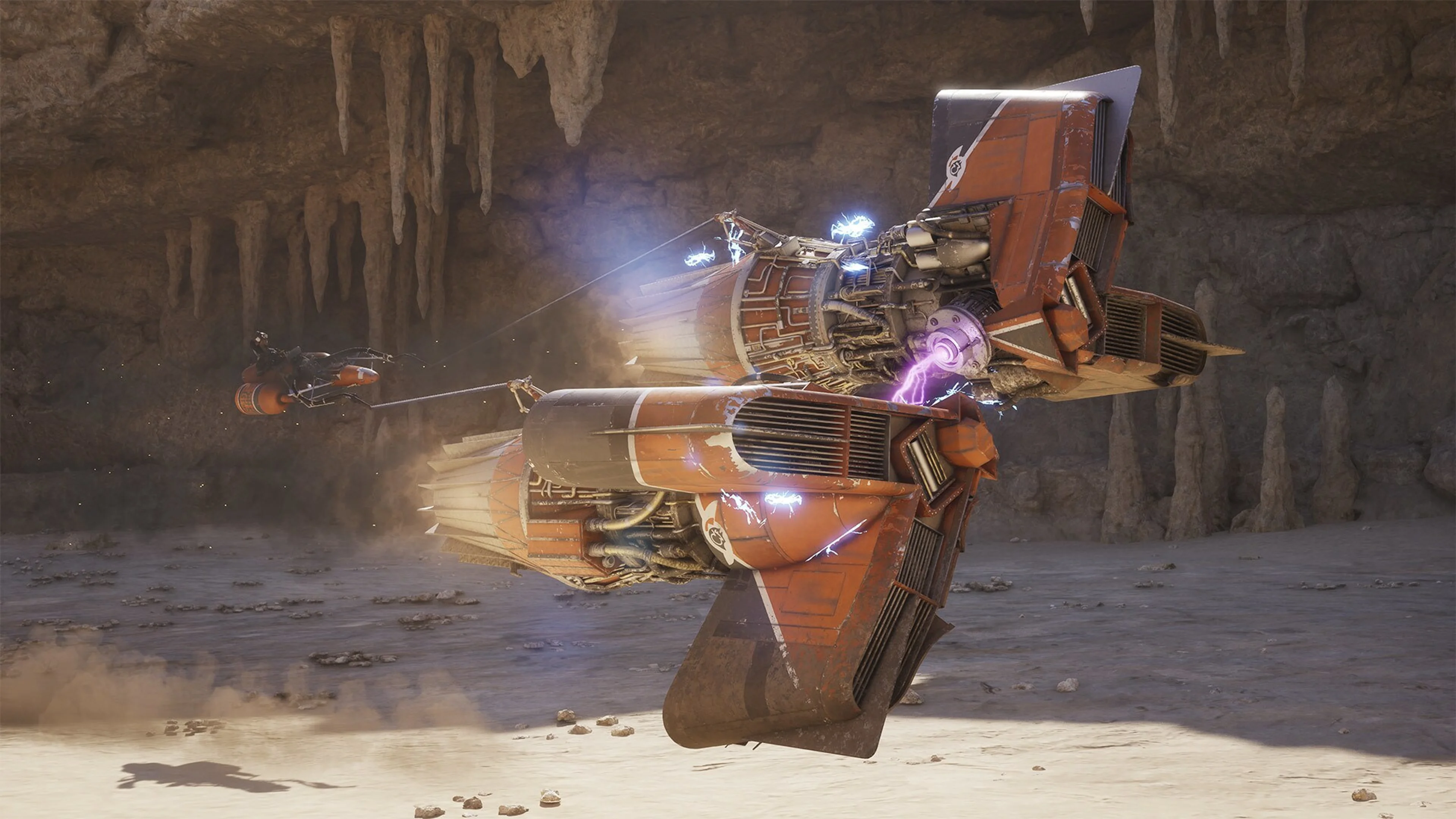 Two orange repulsorcraft collide inside a rocky cavern in Star Wars: Galactic Racer gameplay footage.