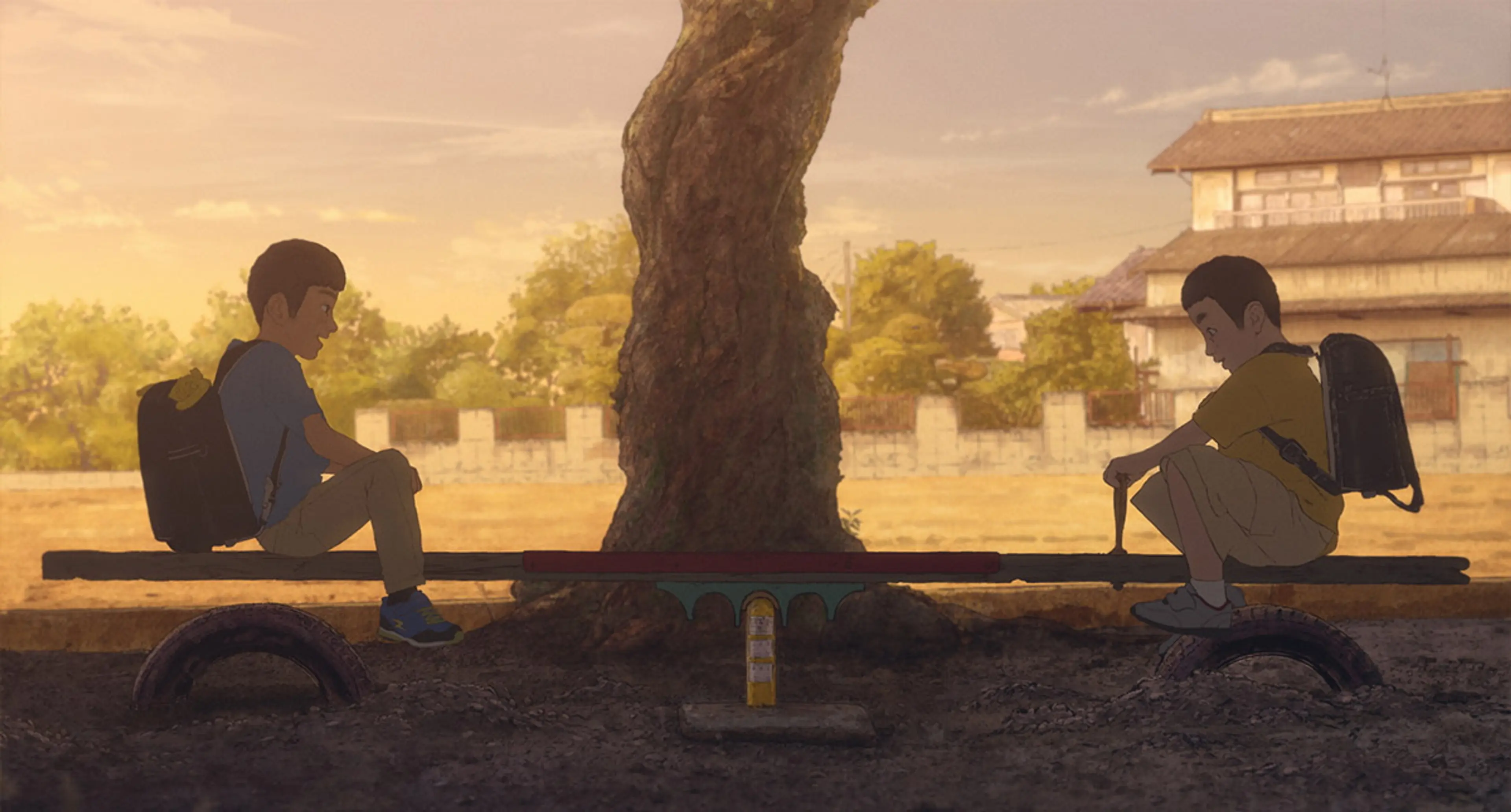 Two schoolboys sit on opposite sides of a seesaw in We Are Aliens.