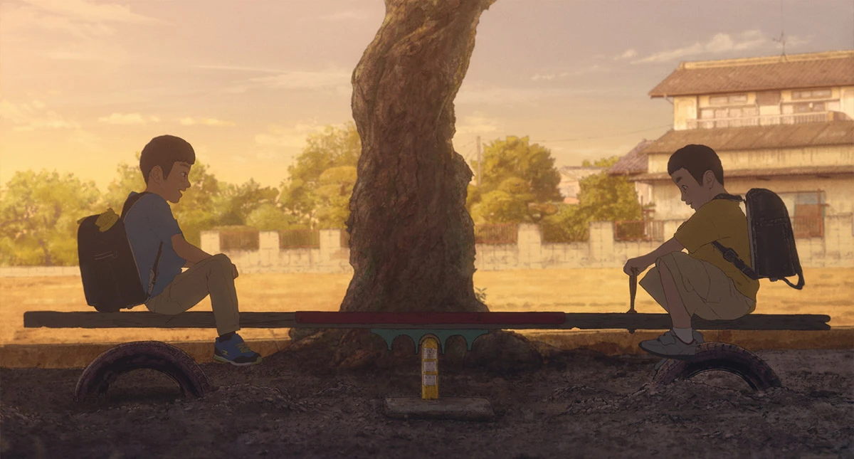 Two schoolboys sit on opposite sides of a seesaw in We Are Aliens.