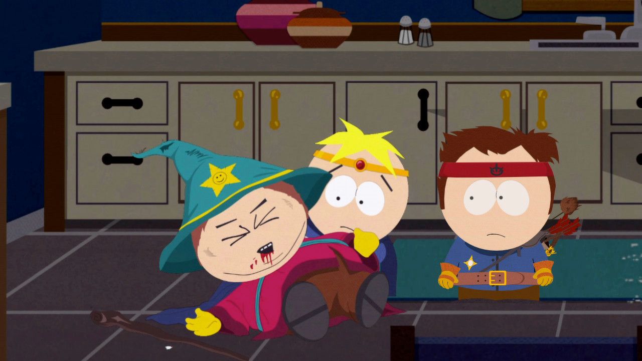 Three costumed South Park children appear together in a kitchen scene.
