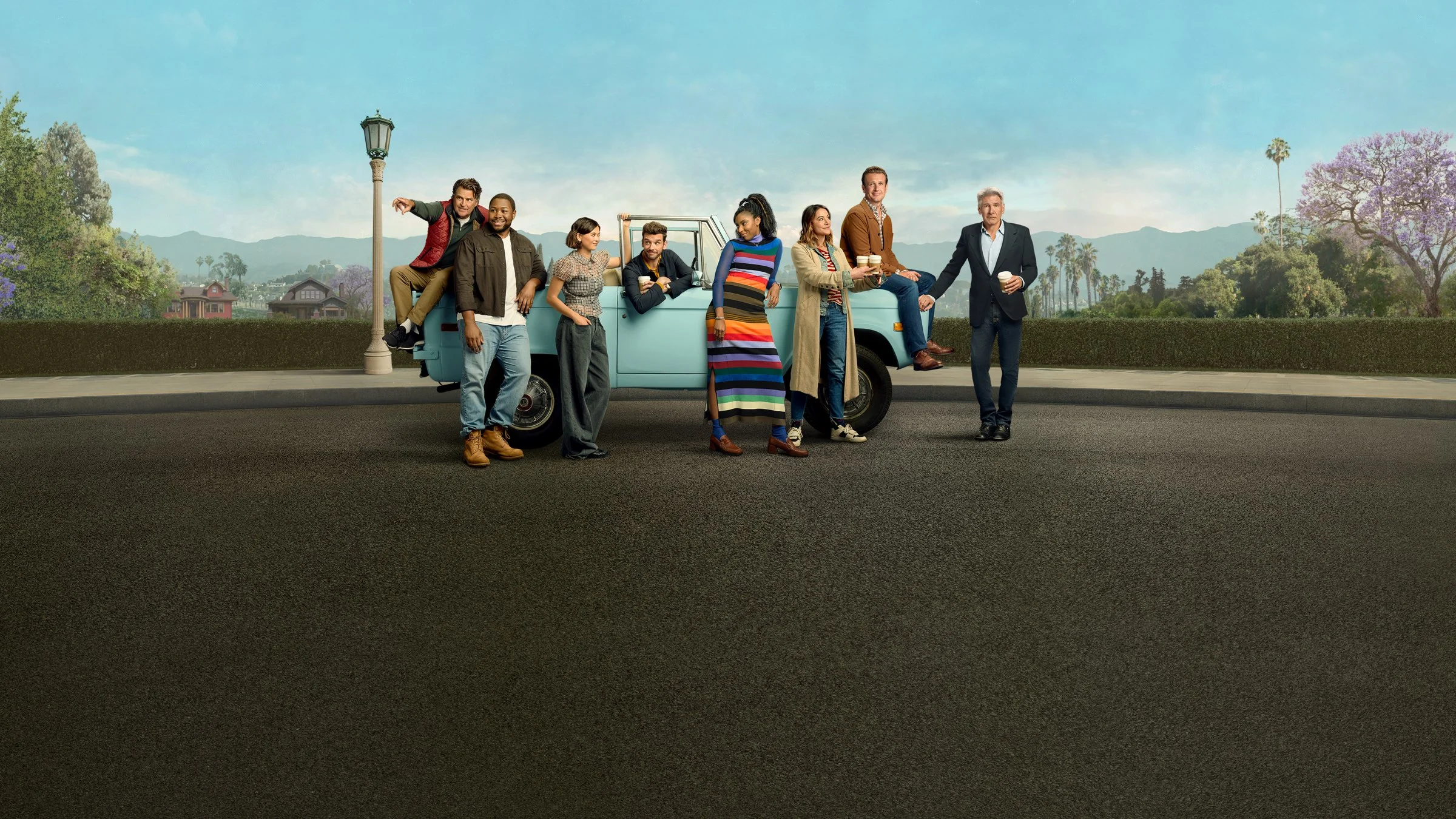 The Shrinking ensemble beside a blue pickup truck in official Apple TV series artwork.