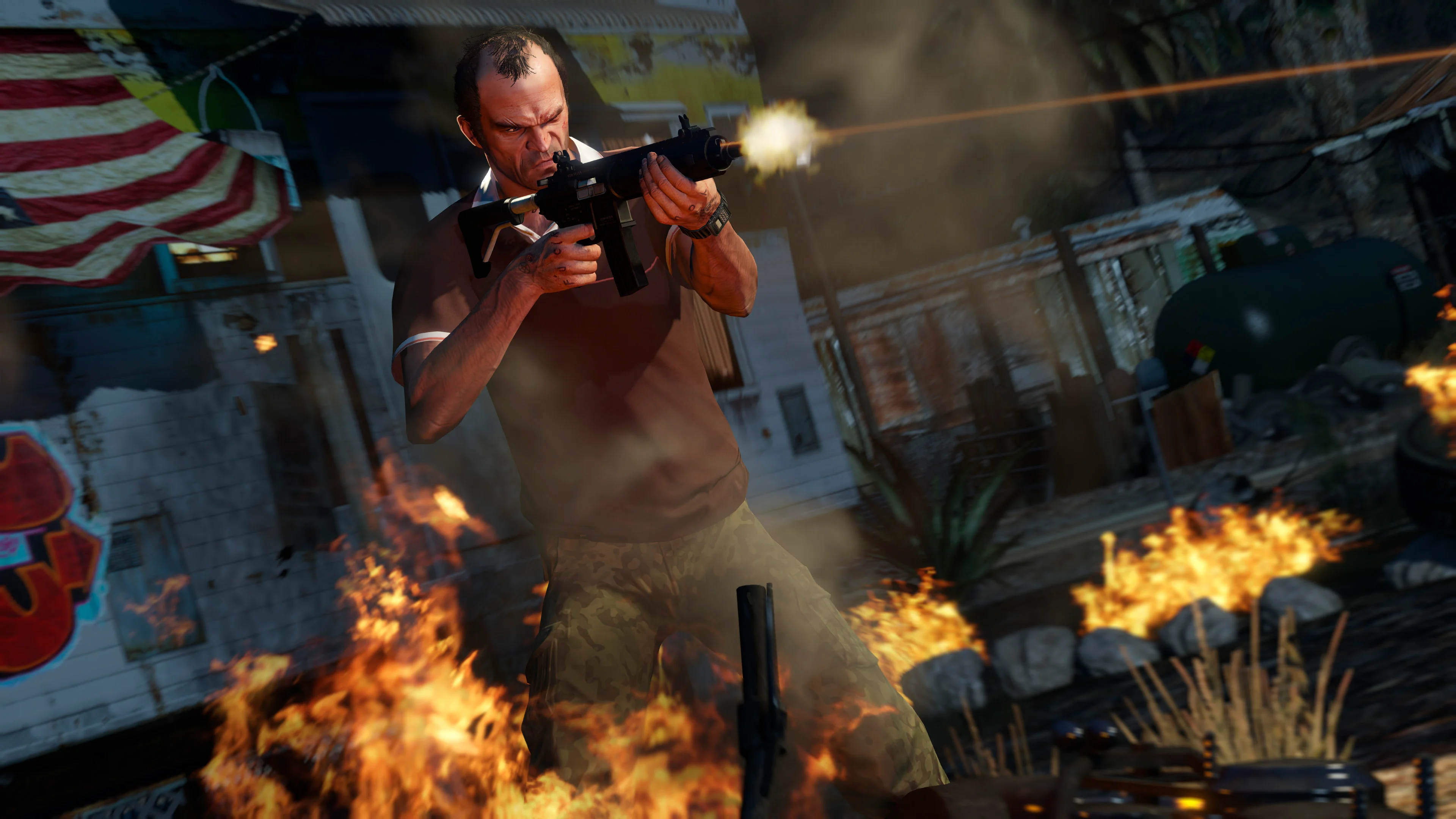 Trevor Philips firing an automatic weapon inside a burning building in GTA 5 Story Mode.