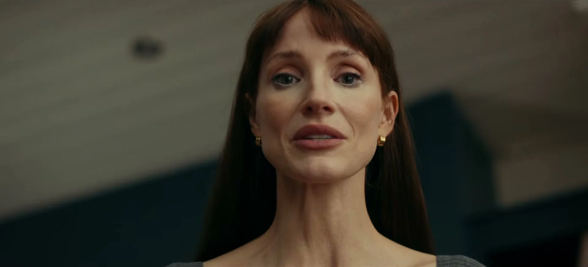 Jessica Chastain appears with an unnaturally elongated neck as Other Mommy.