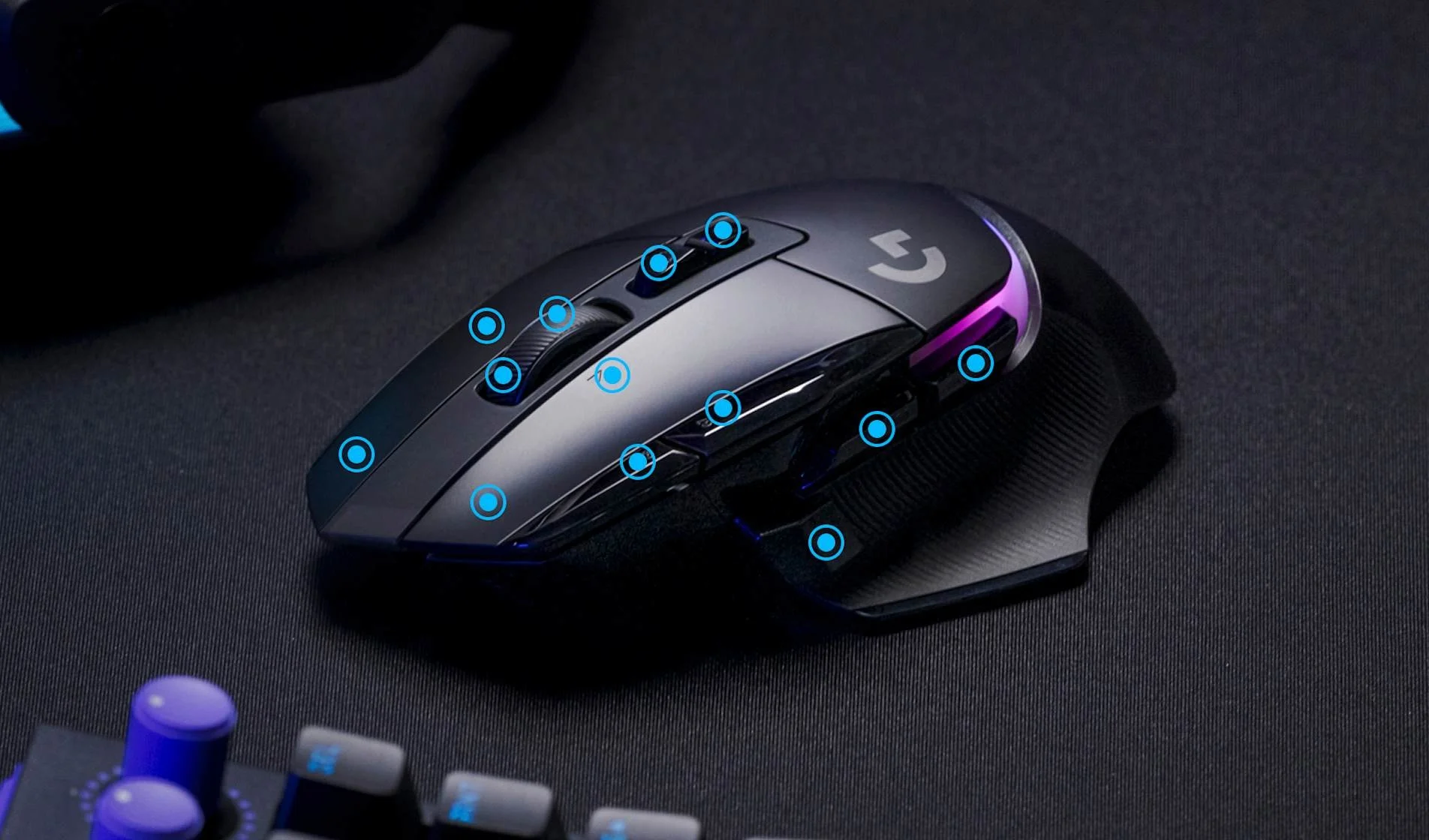 Logitech illustration highlighting the controls on a black and purple G502 X Plus