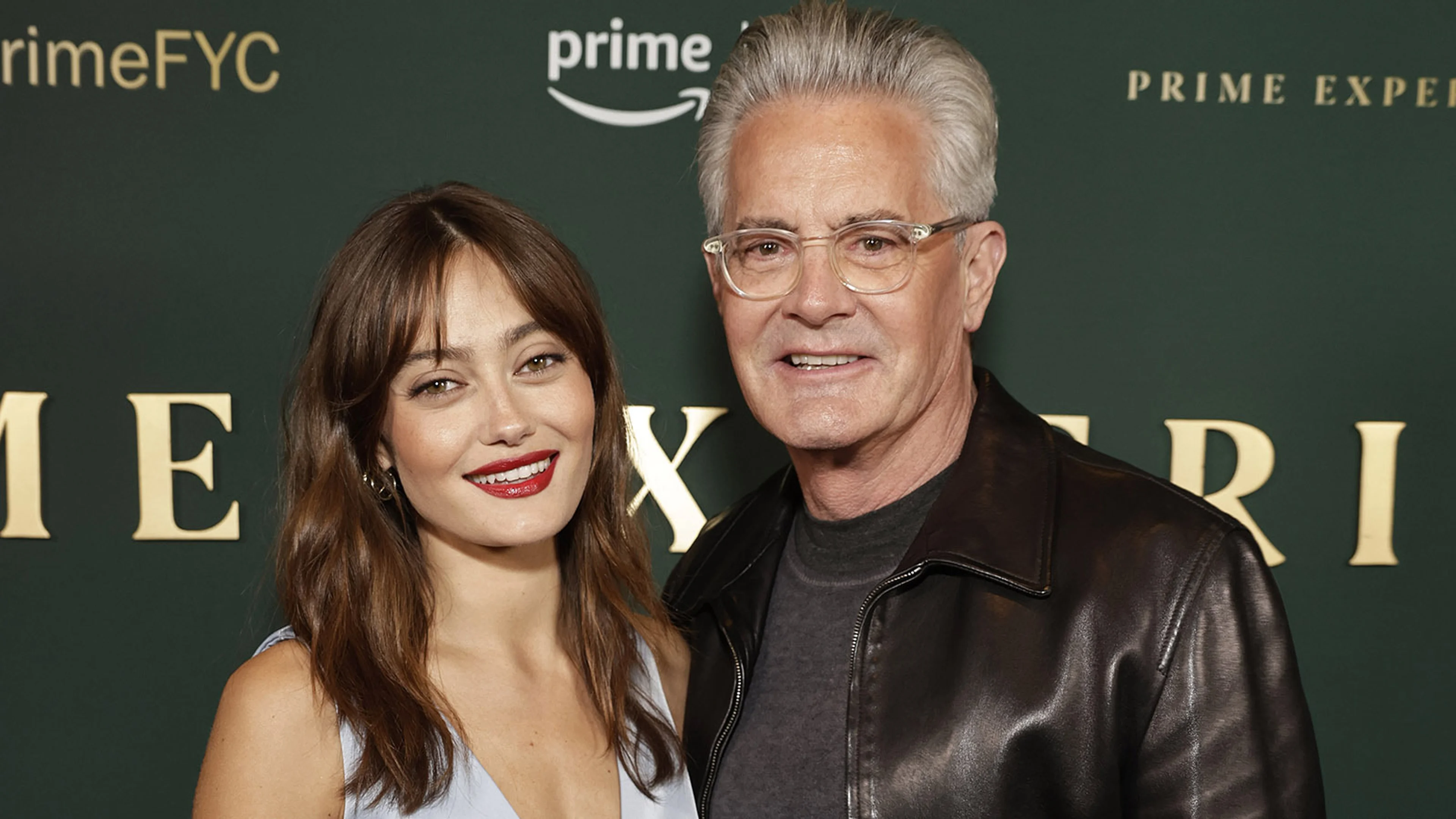 Kyle MacLachlan and Ella Purnell pose together at a Fallout event.