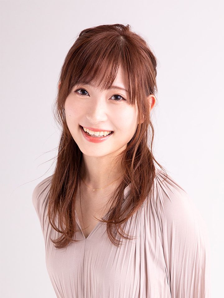 Haruka Shiraishi smiling in a pale blouse.