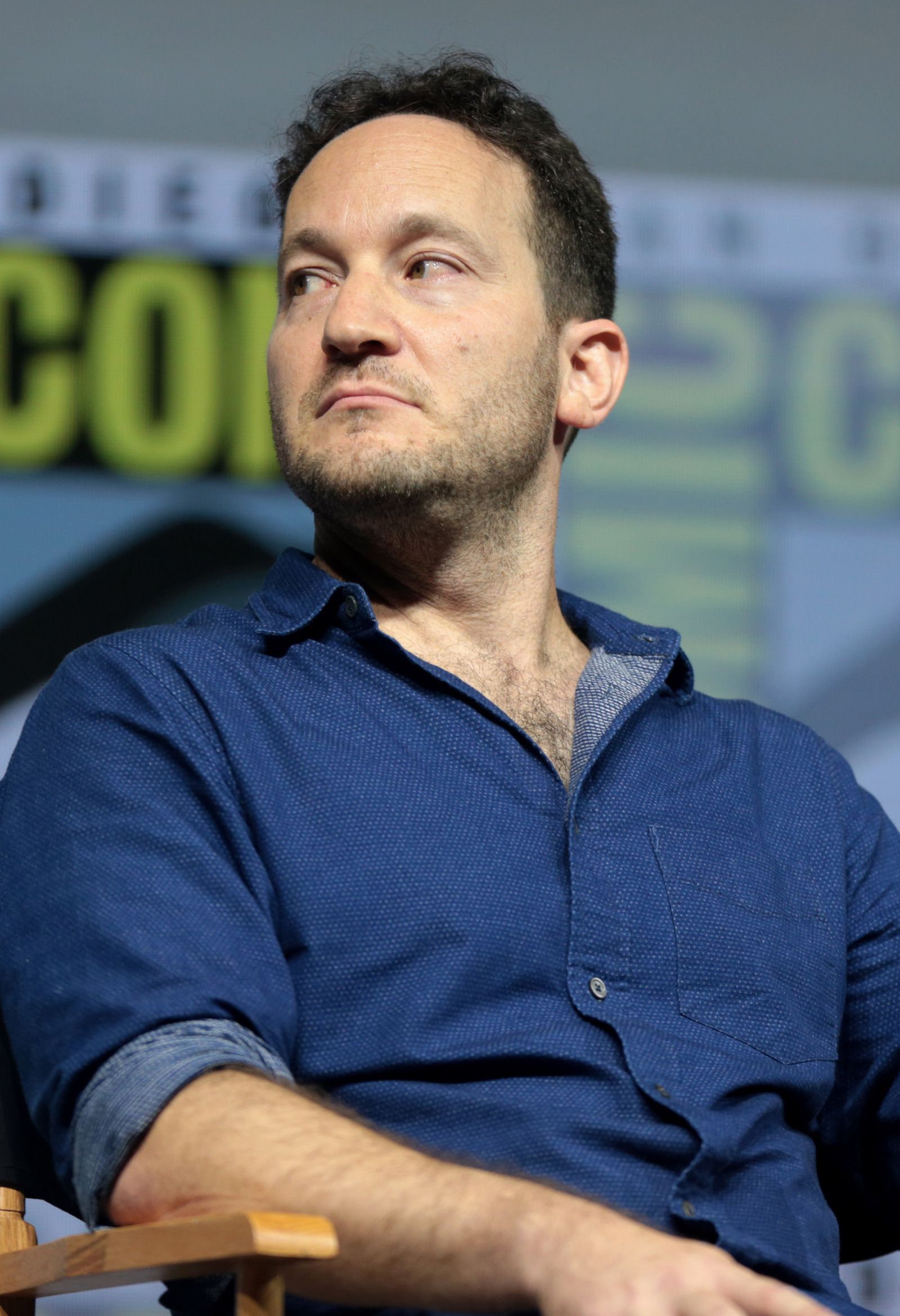 Rodney Rothman sits onstage during a San Diego Comic-Con panel in 2018.