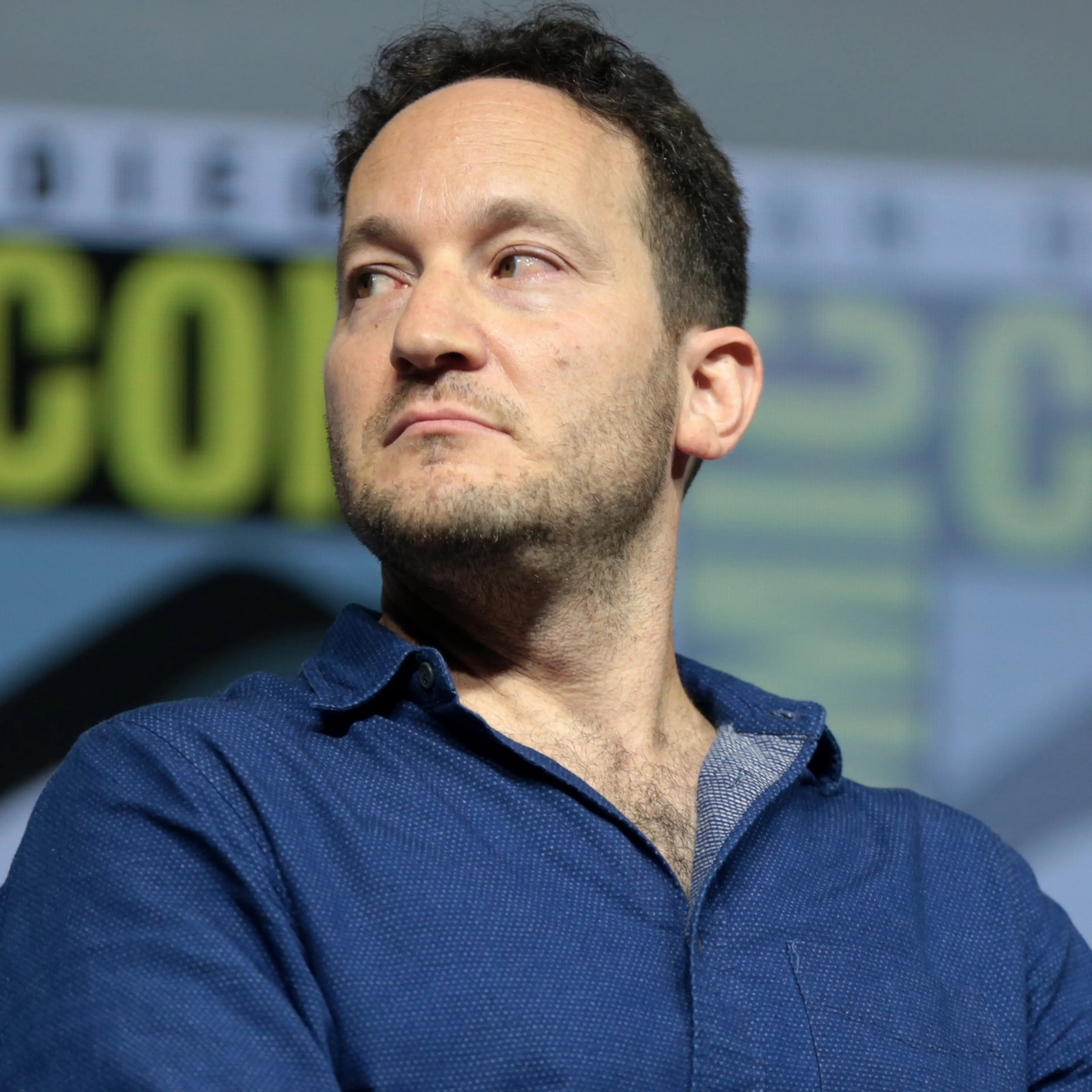 Rodney Rothman sits onstage during a San Diego Comic-Con panel in 2018.
